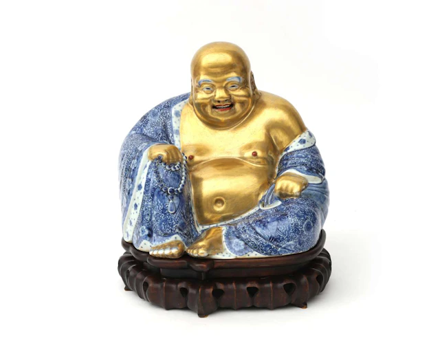 A porcelain Buddha, China, 20th century