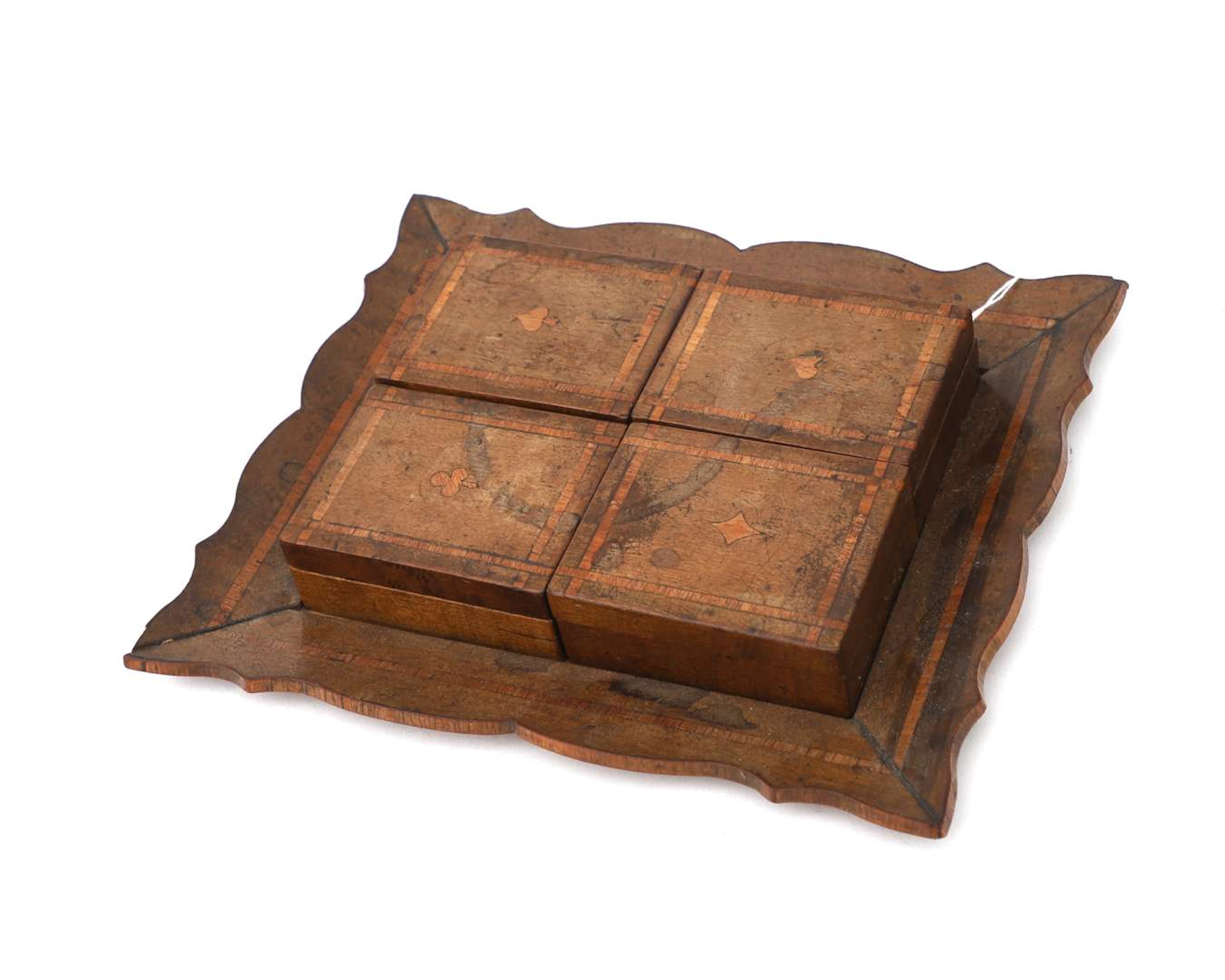 A wooden games set with bone tokens, circa 1900