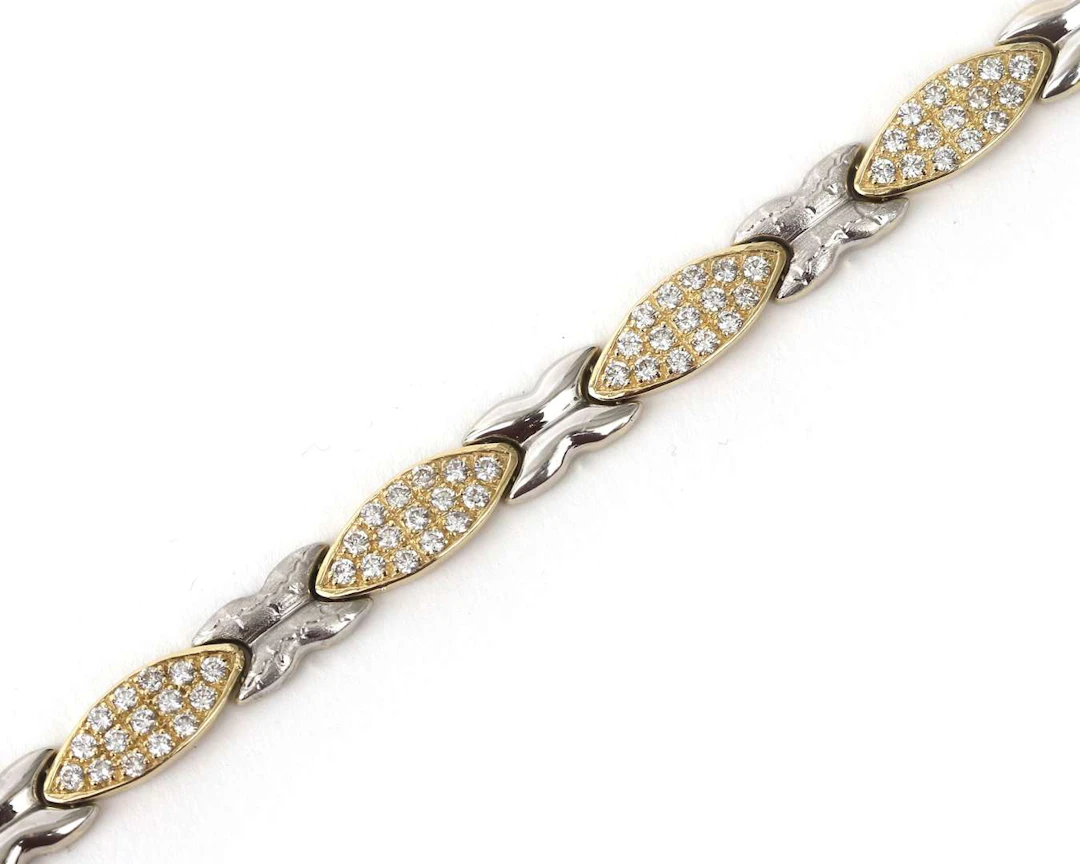A 14k two-tone gold bracelet with cubic zirconia