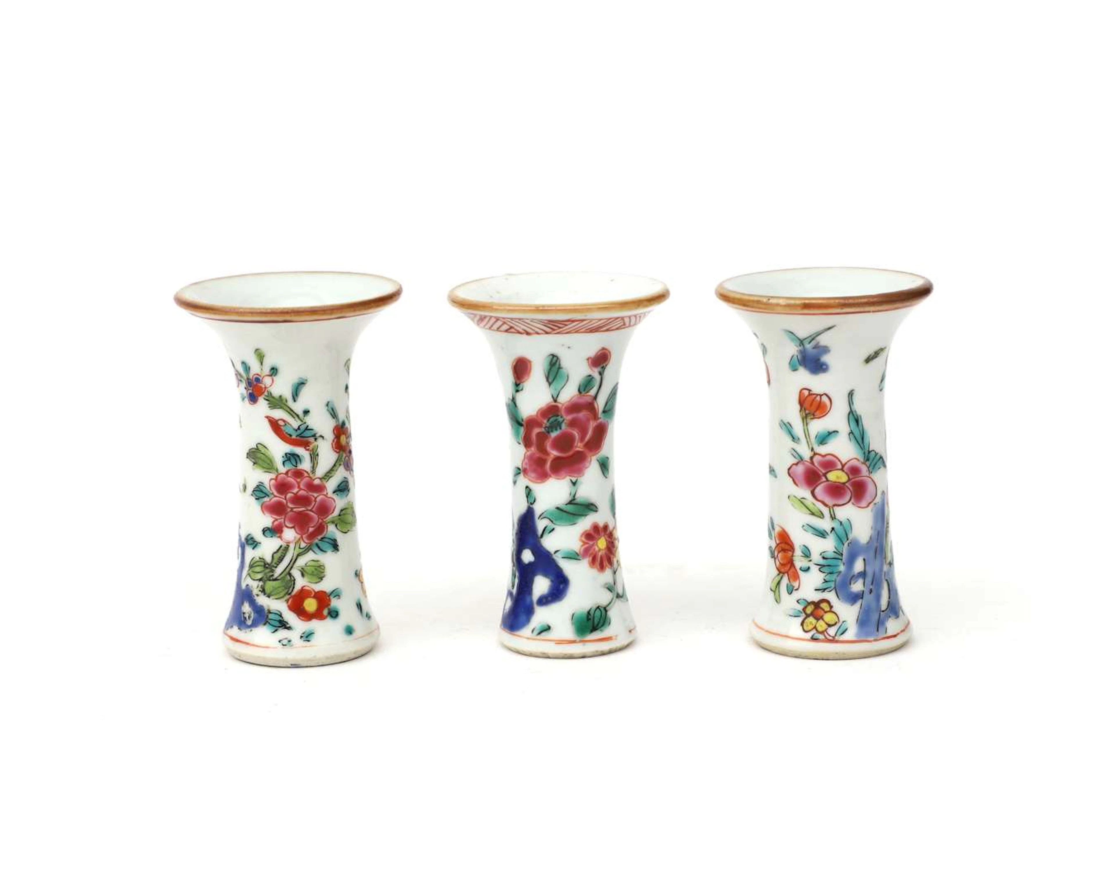 Three miniature porcelain trumpet vases, China, 18th century