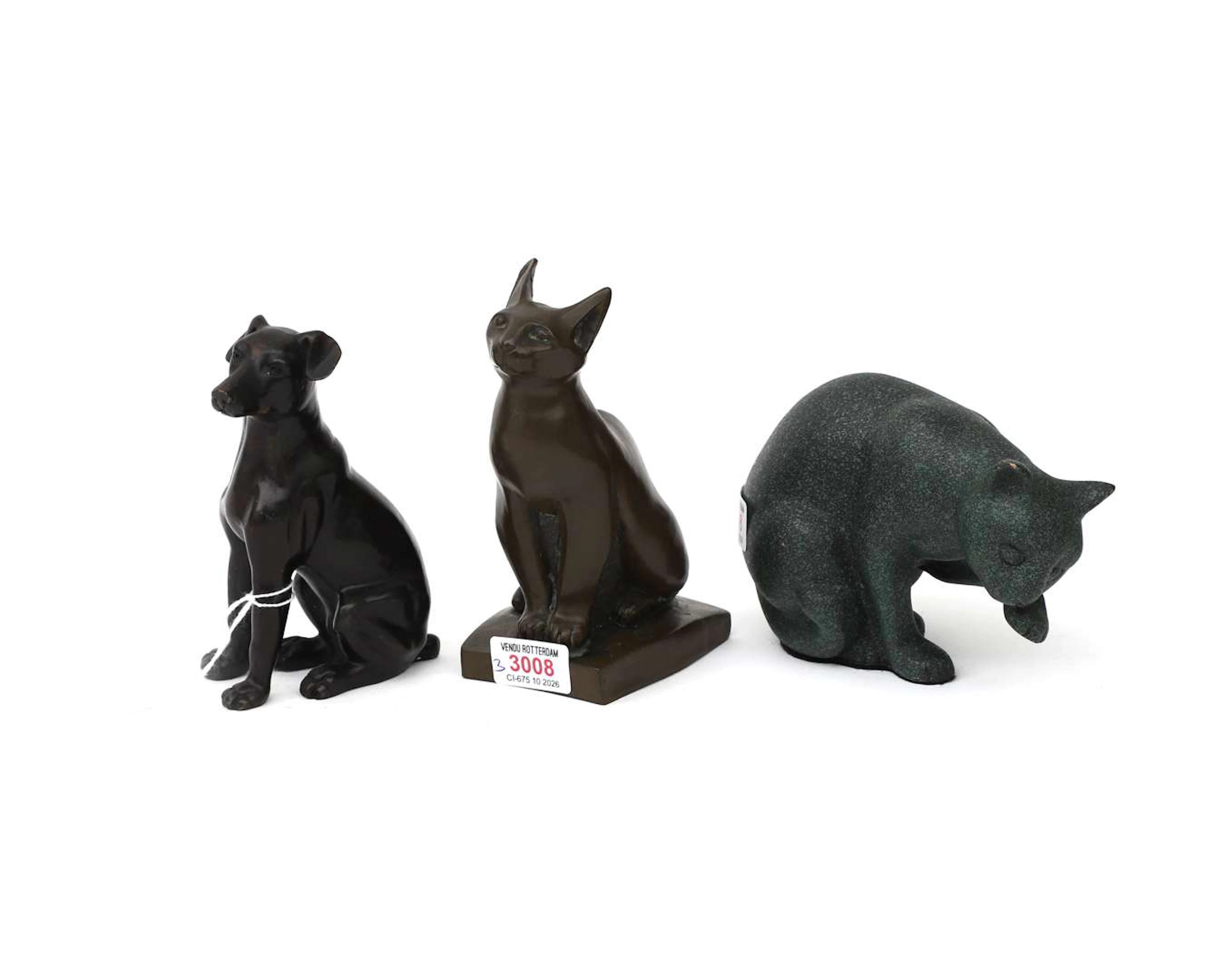 Three different bronze sculptures. Two cats and a dog