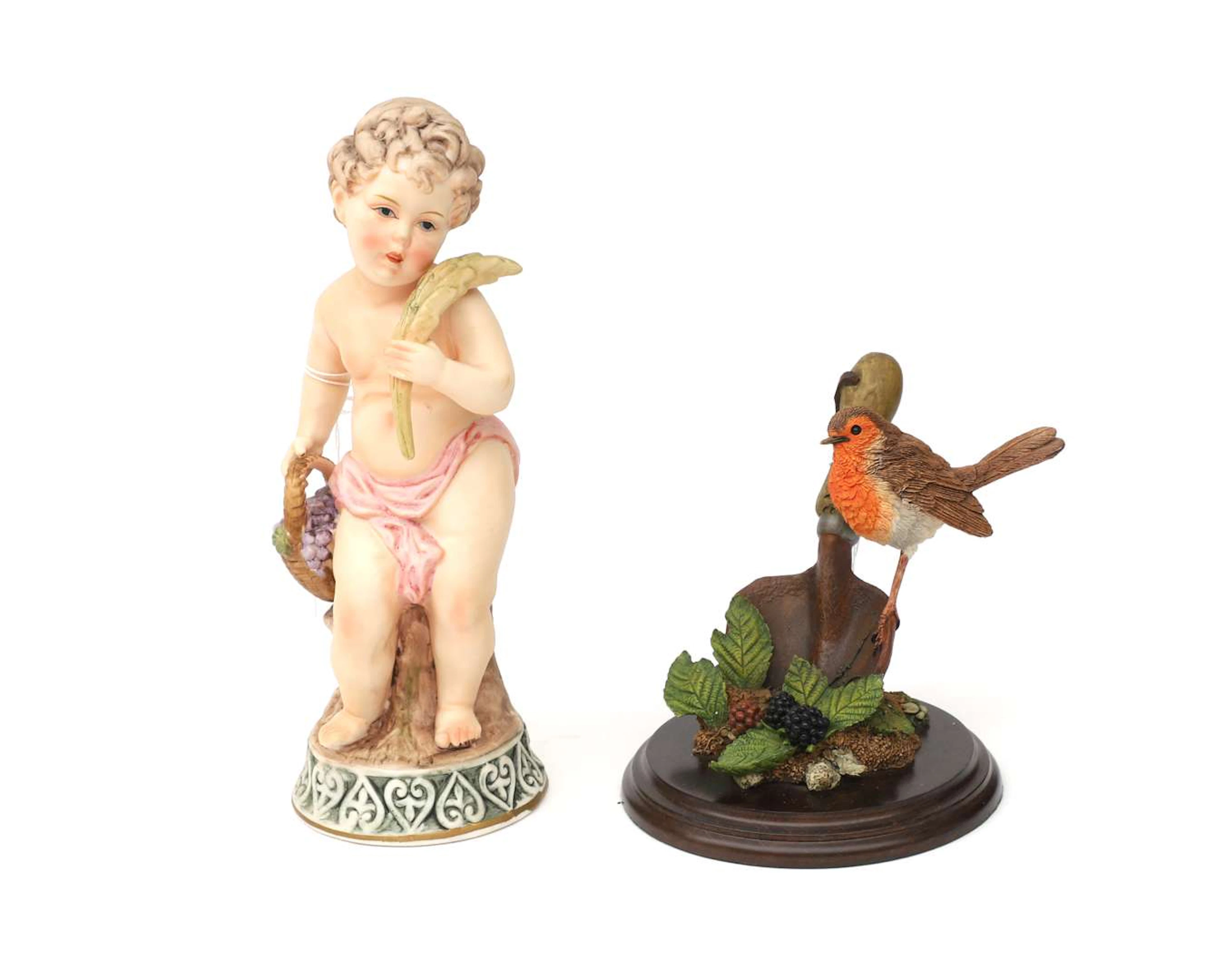A biscuit porcelain and a resin sculpture, 20th century