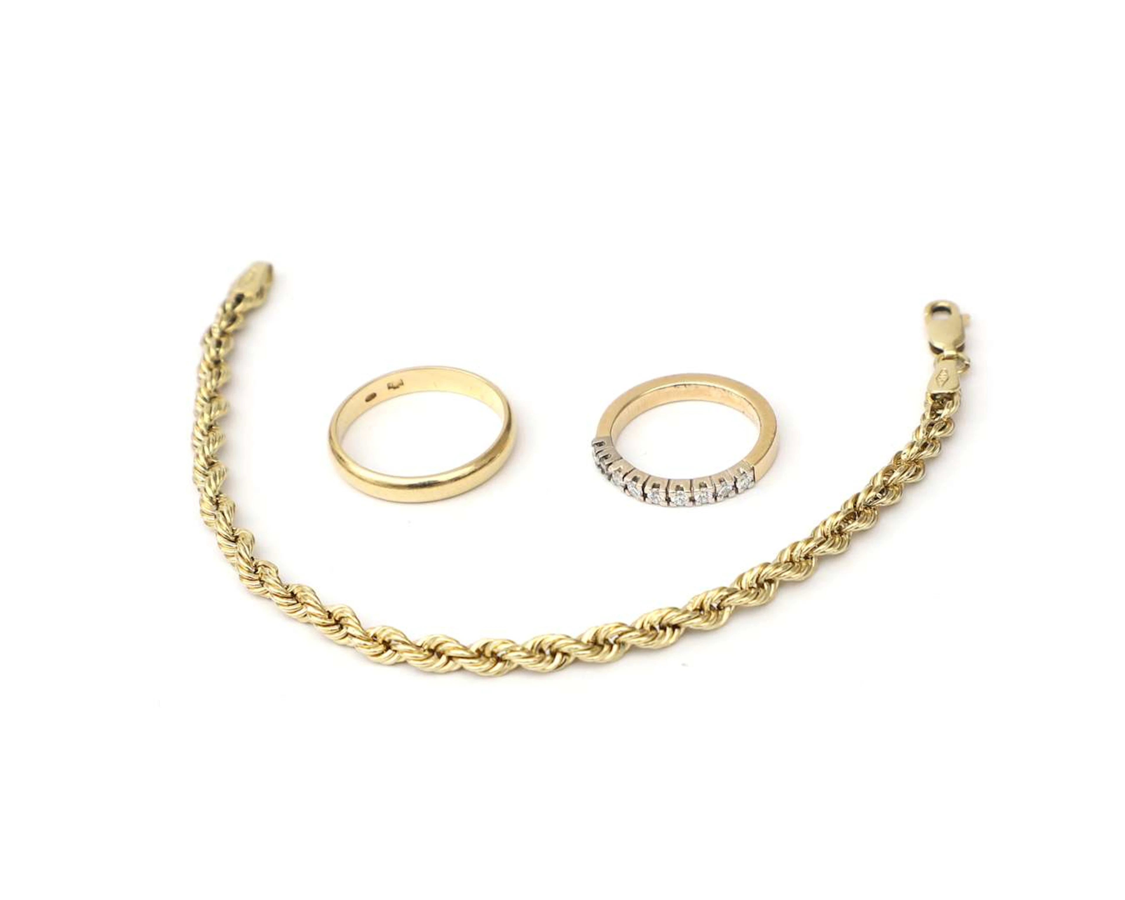 A lot comprising of 14k yellow-gold jewellery, including a diamond ring