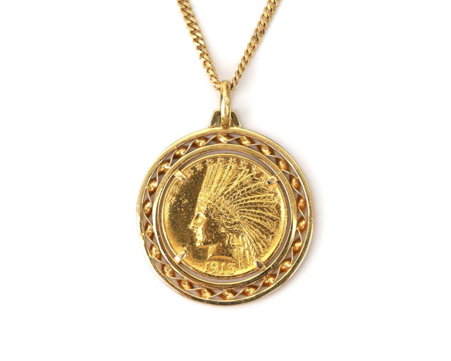 An 18k yellow gold gourmet necklace with a 1913 $10 coin
