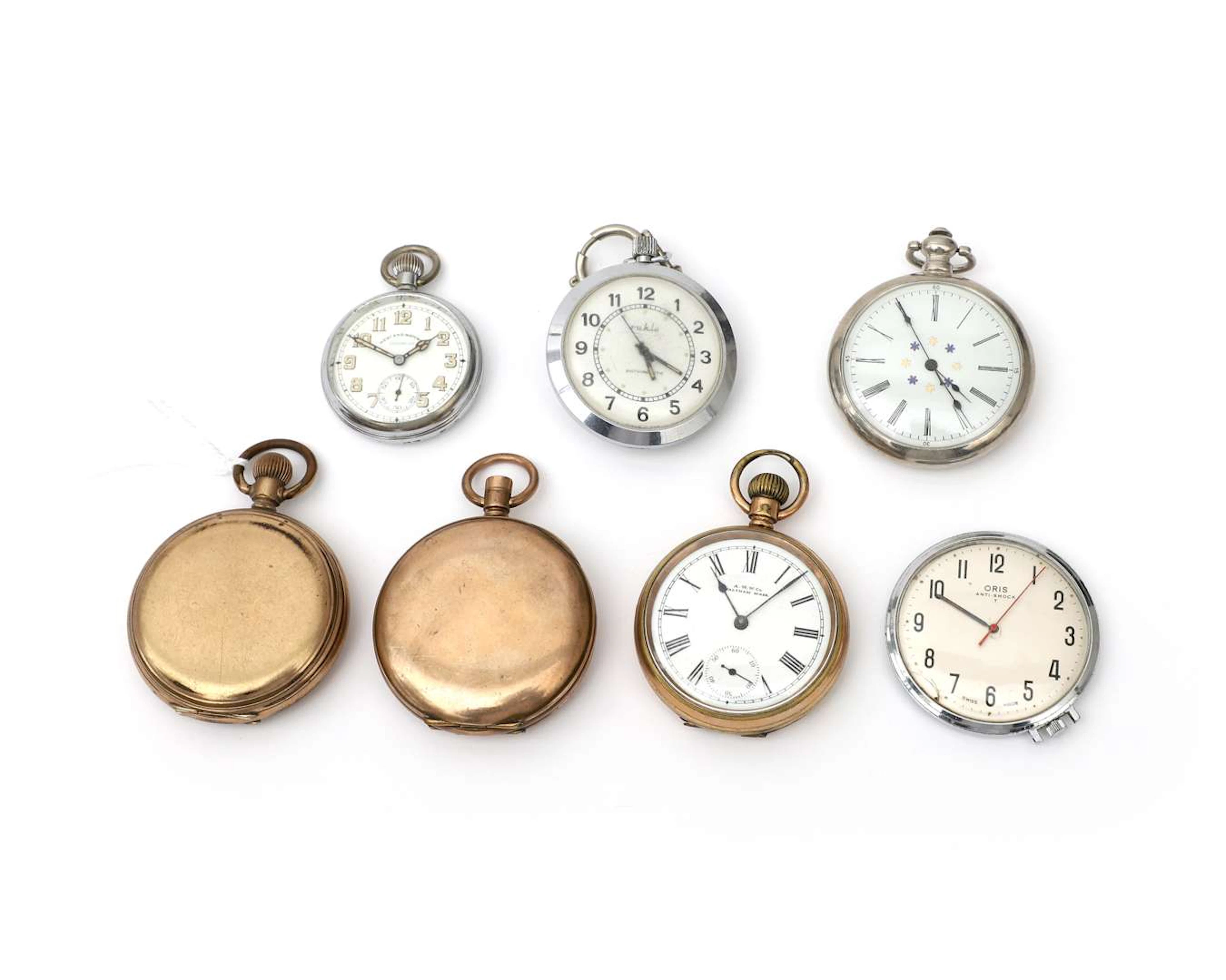 Seven pocket watches, including an Oris Anti-Shock T watch
