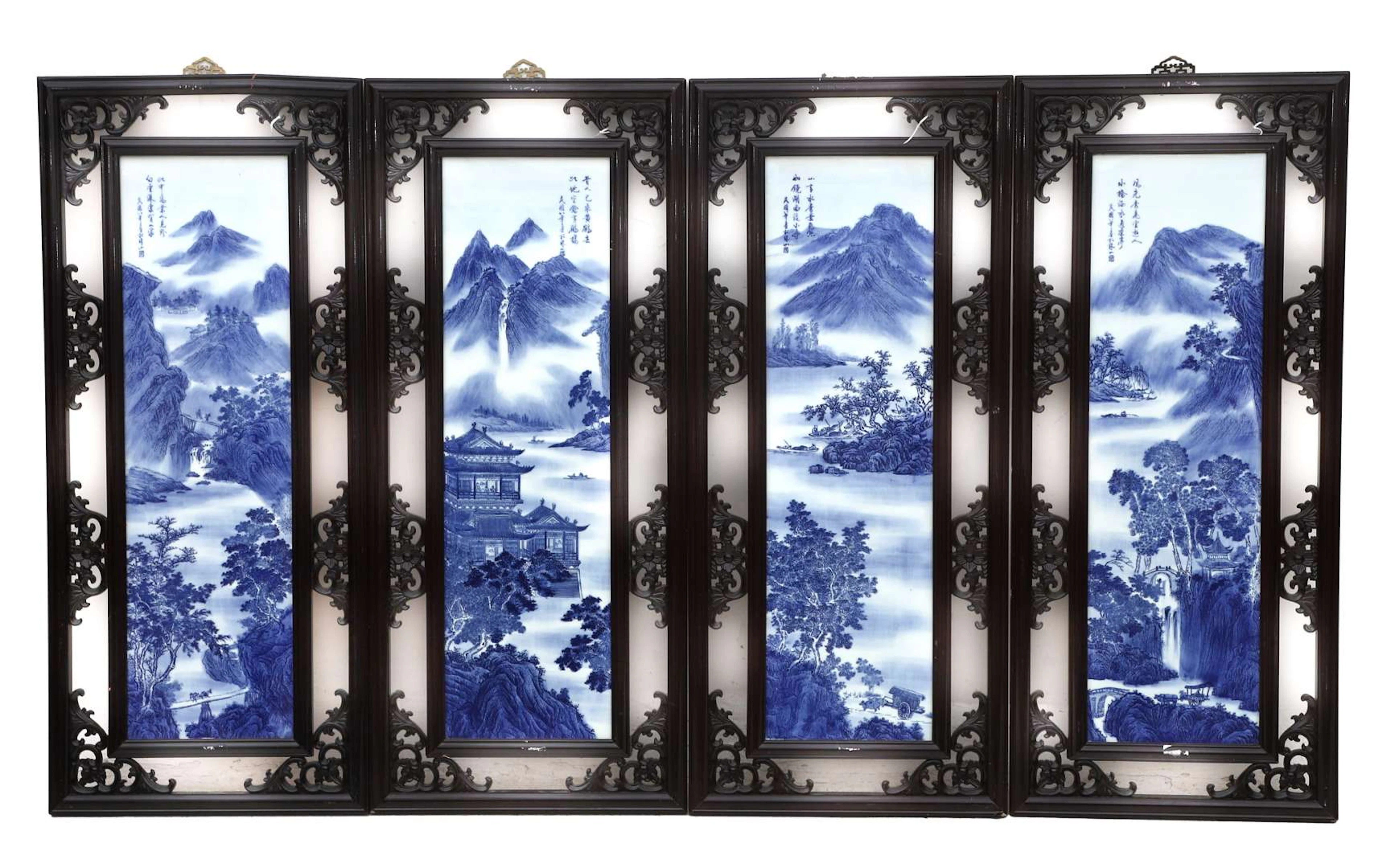 Four framed porcelain panels depicting mountain scenes, China, 20th century