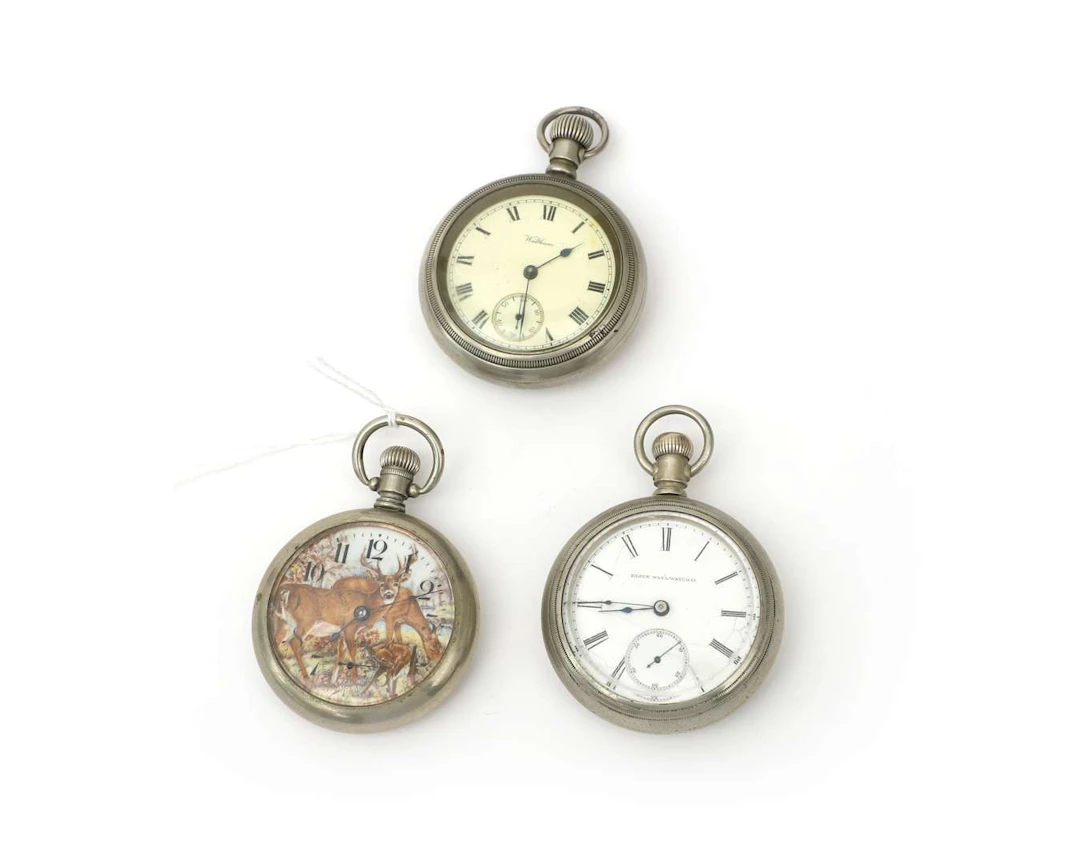 Three pocket watches, including an Elgin and a Waltham