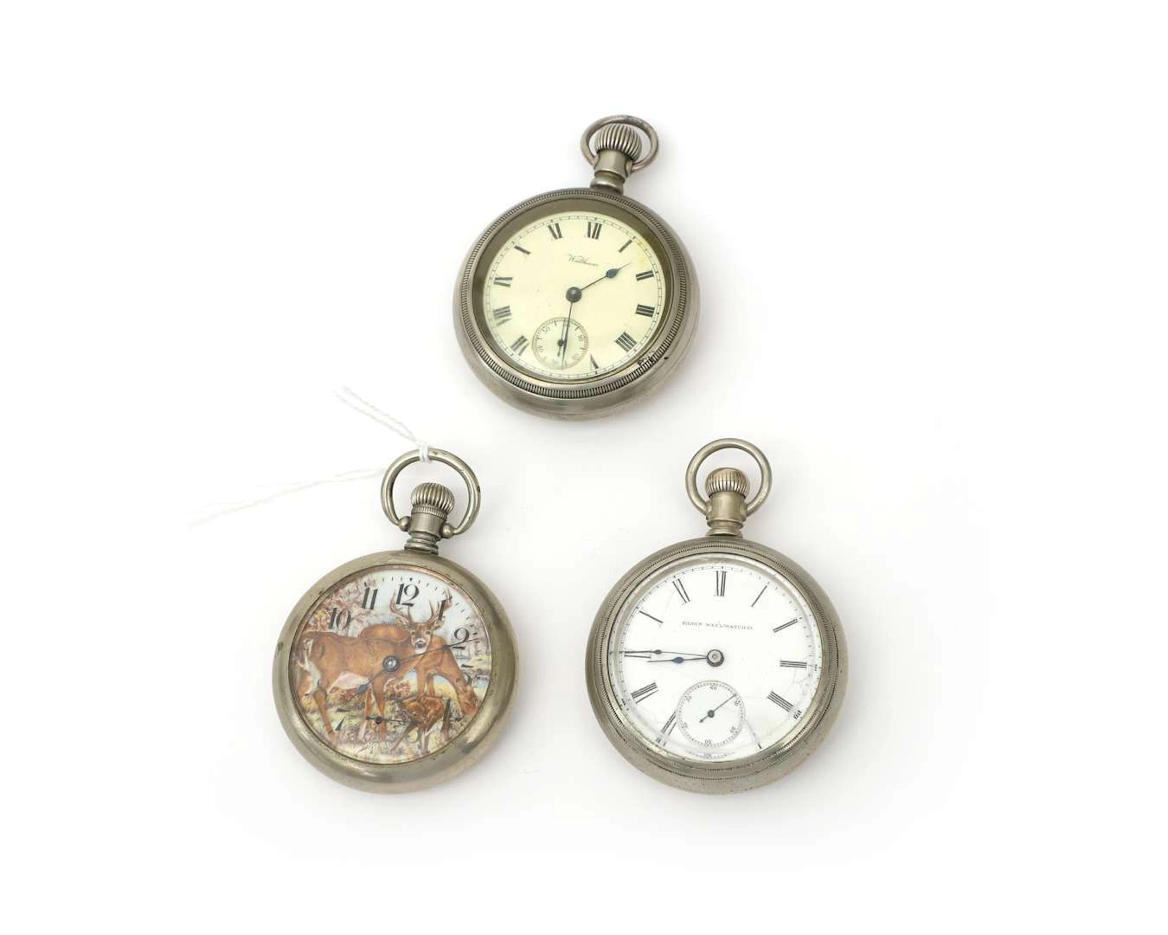 Three pocket watches, including an Elgin and a Waltham