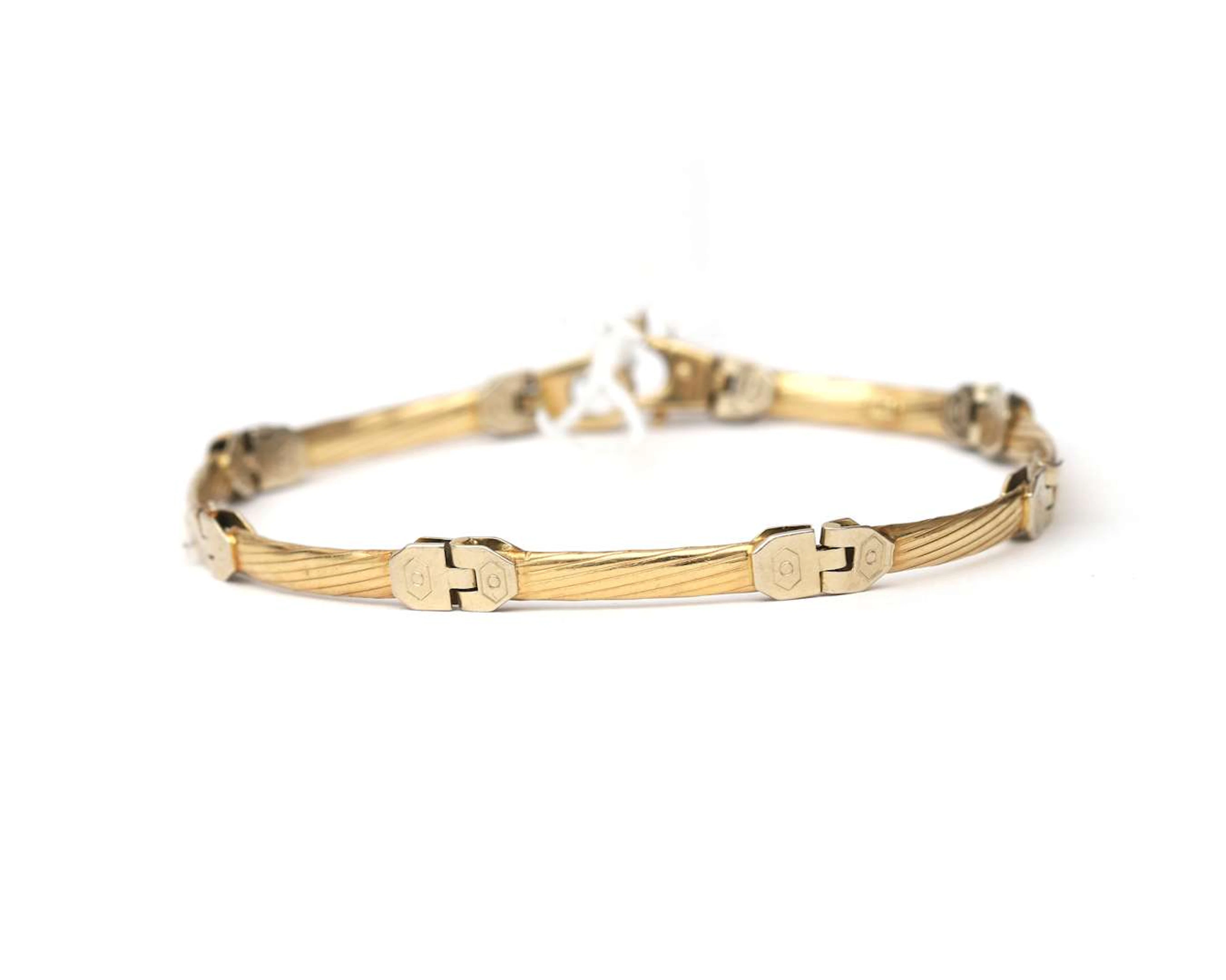 A 14k bicolour gold link bracelet