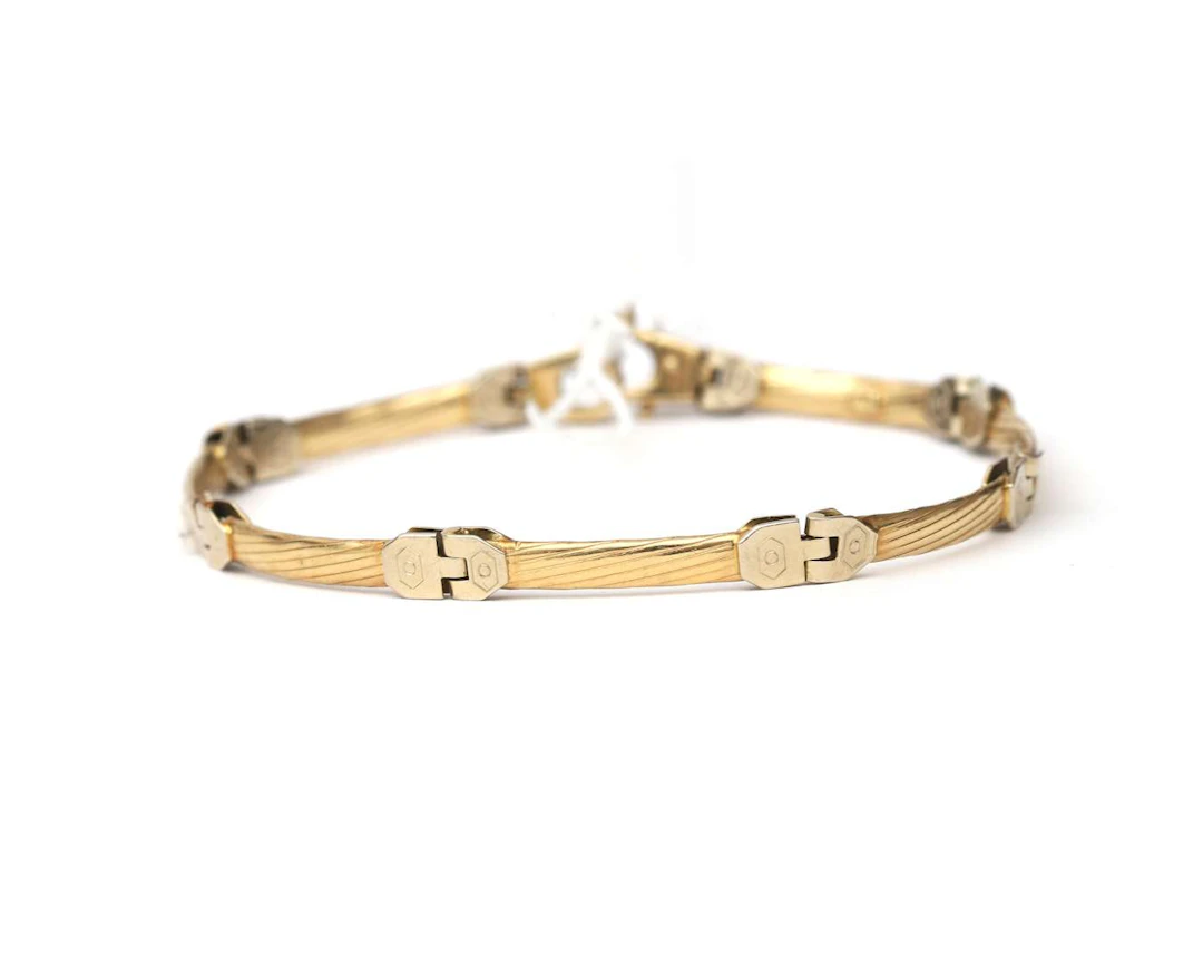 A 14k bicolour gold link bracelet