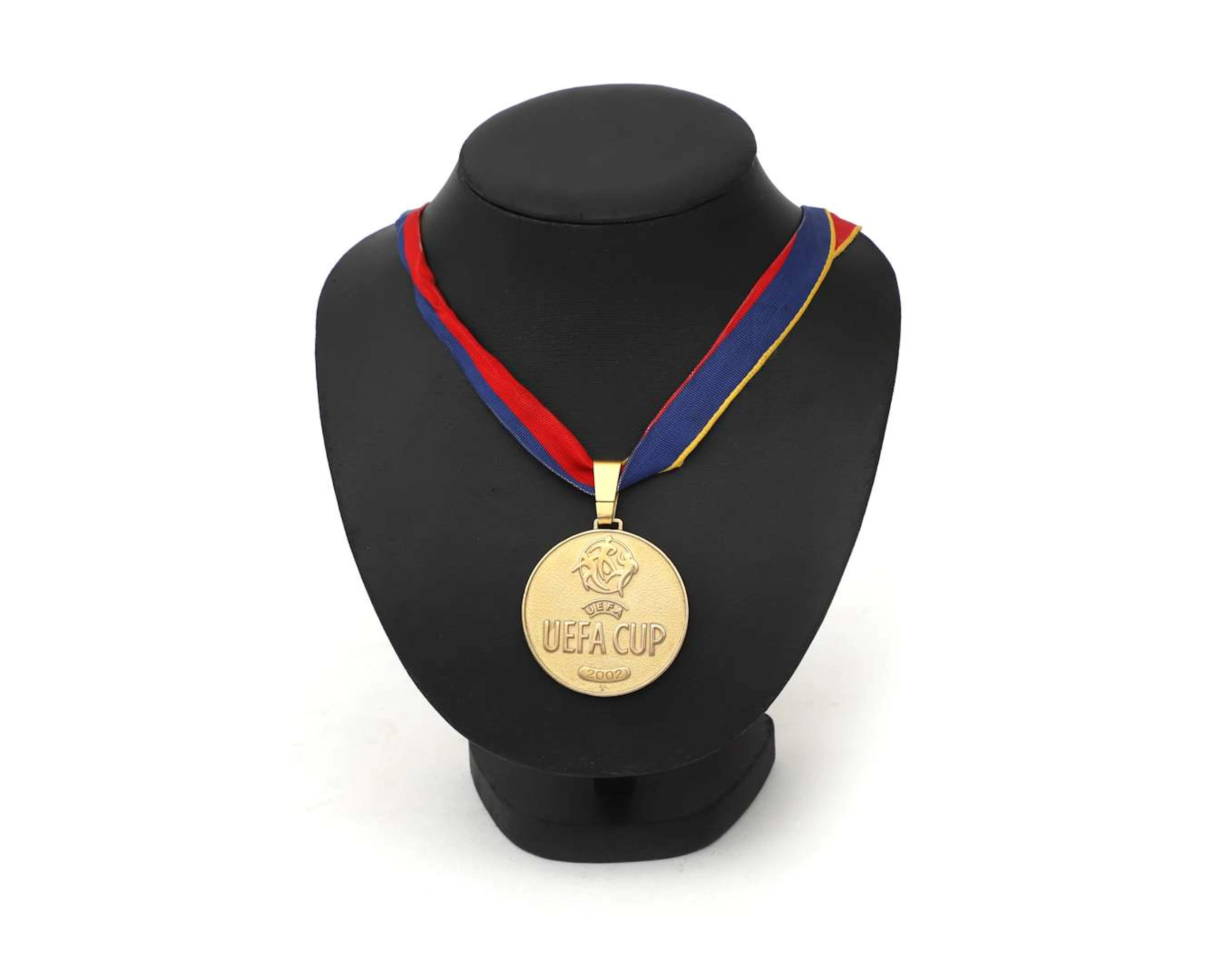 A 2002 UEFA Cup winners’ medal, Feyenoord v Borussia Dortmund 3–2