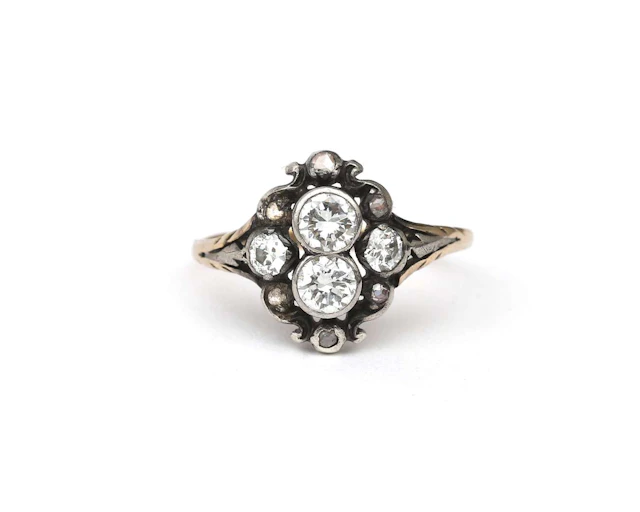 A 14-carat yellow gold and silver ring set with a diamond, late 19th century