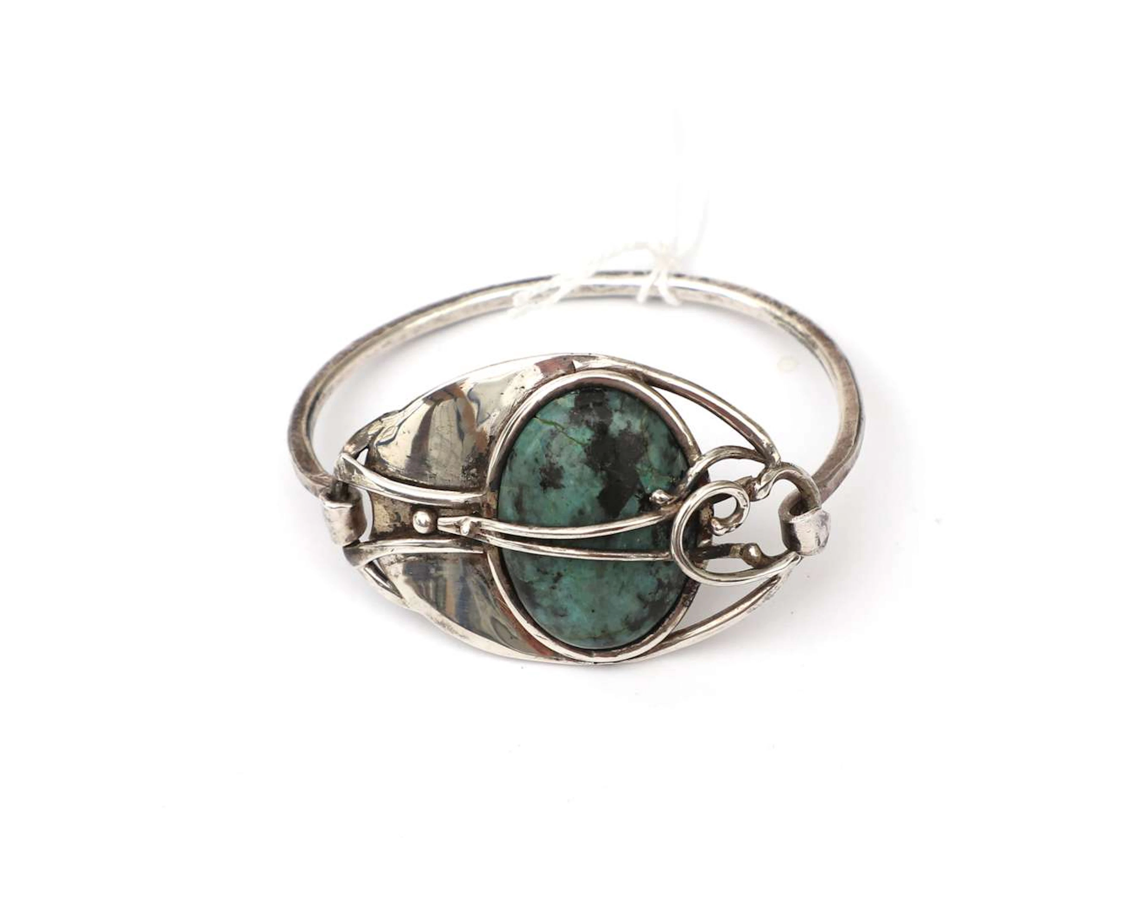 A sterling silver bracelet with turquoise