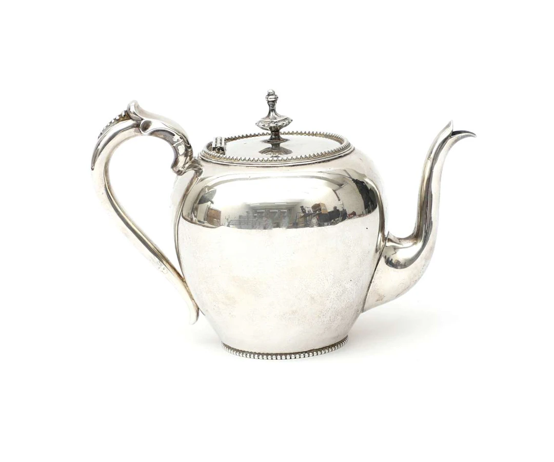 A silver teapot, Netherlands, Voorschoten, 1884