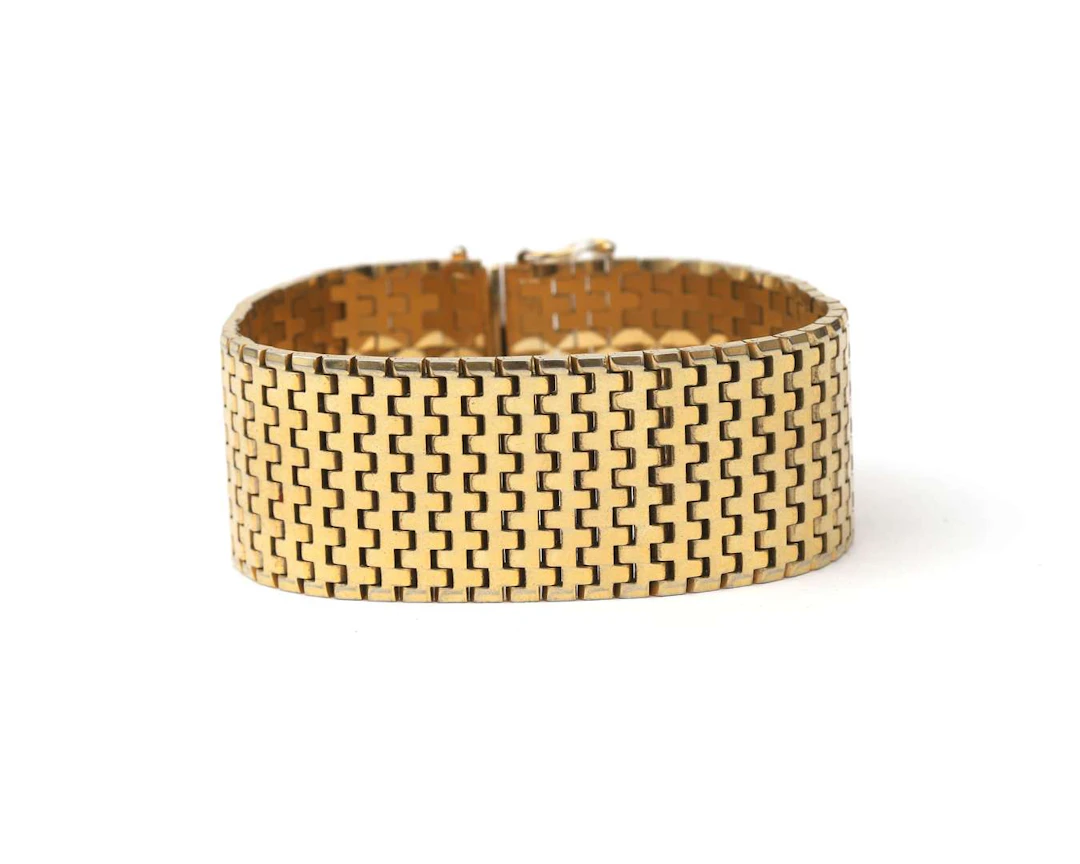 A wide, gold-plated link bracelet, 1950s
