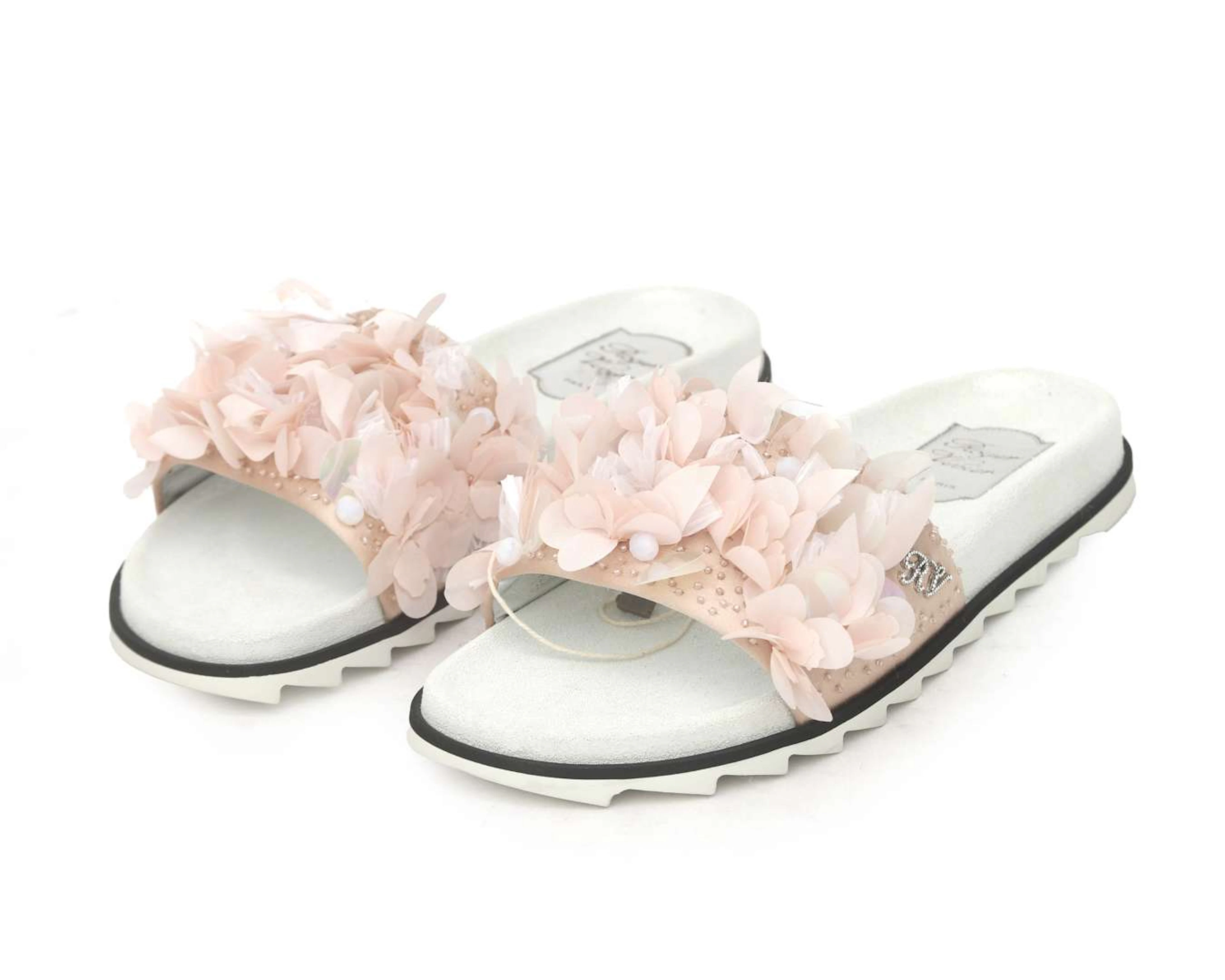 A pair of light pink Roger Vivier slippers