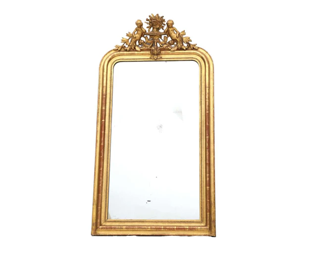 A mirror in a gold-coloured wooden frame, 19th century