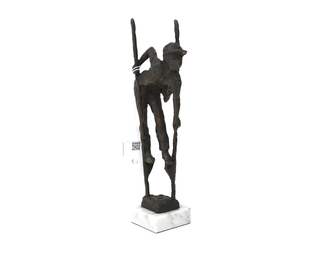 A bronze sculpture of a wader, 20th century