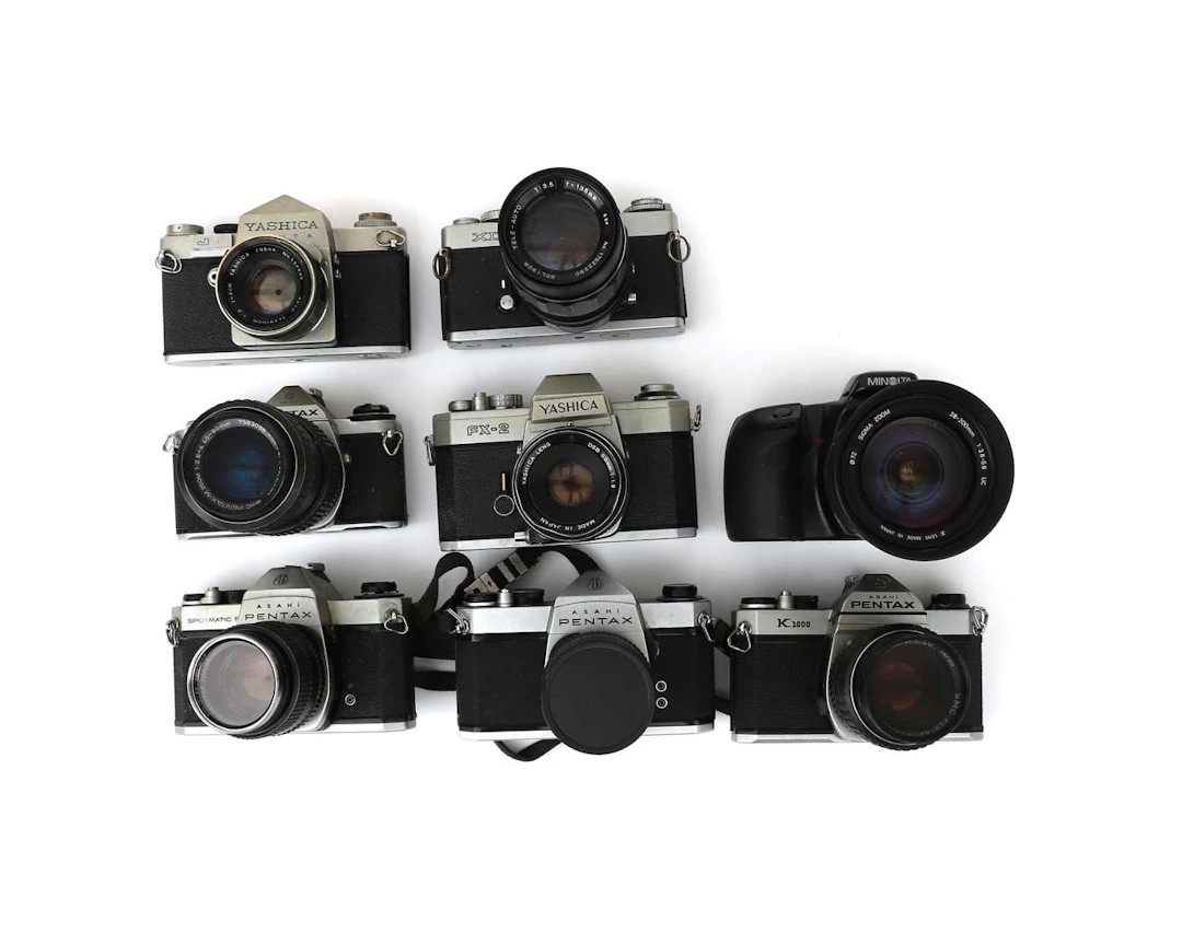 A collection of Japanese 35mm cameras, including Minolta, Yashica