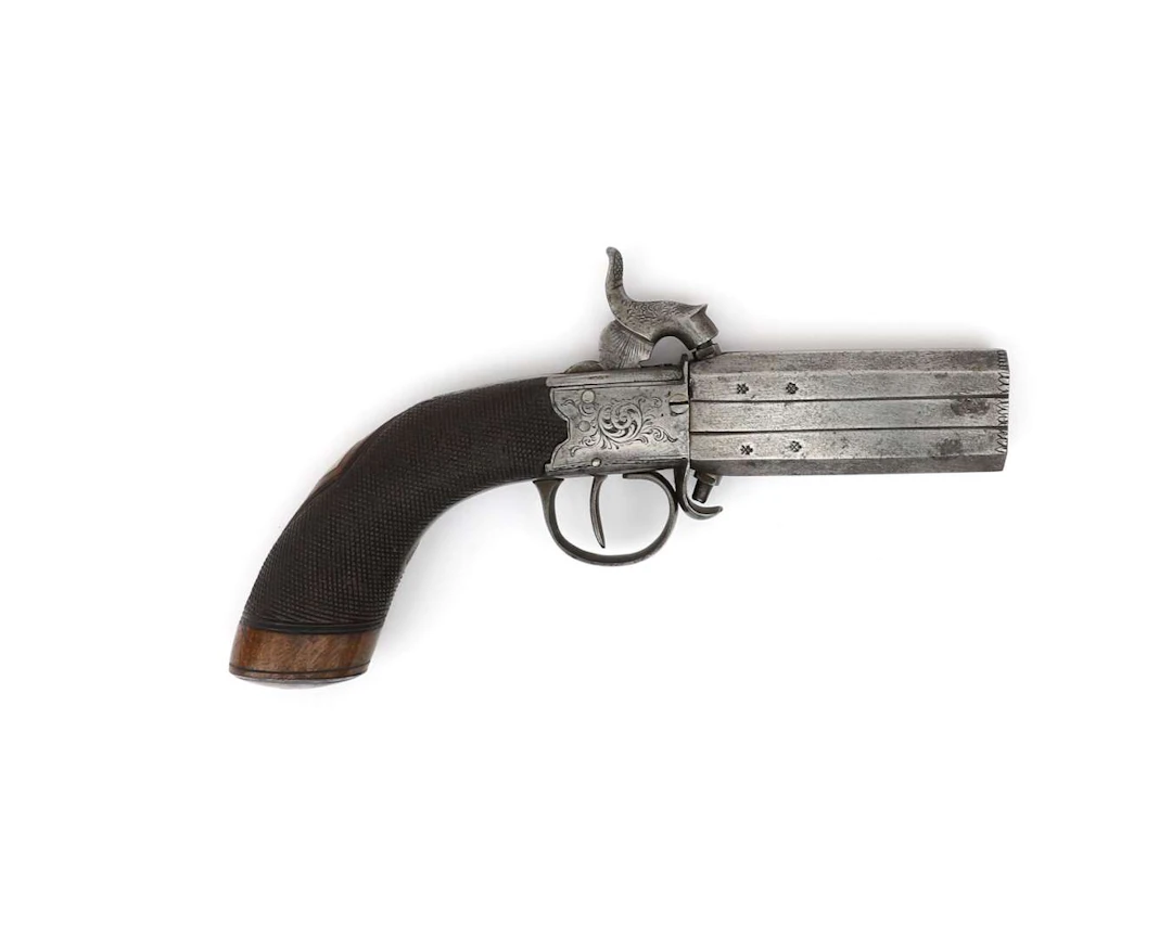 A percussion revolver, England, 19th century