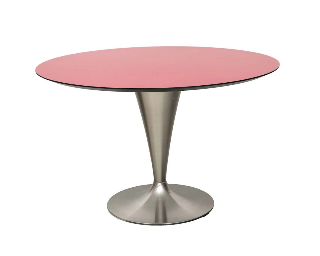 A round dining table with a red laminate top and metal legs. 20th/21st century