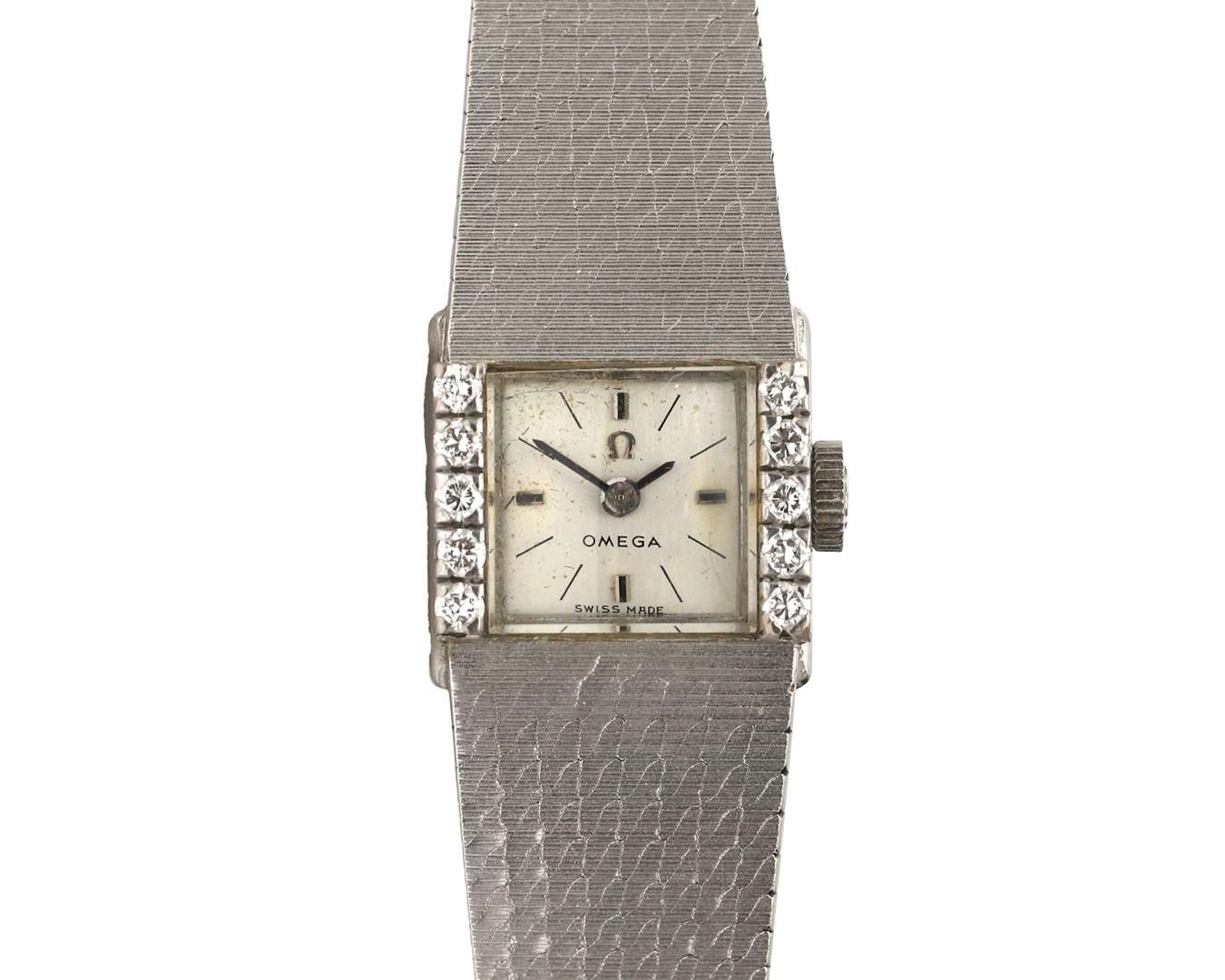 An 18k white gold ladies’ wristwatch by Omega