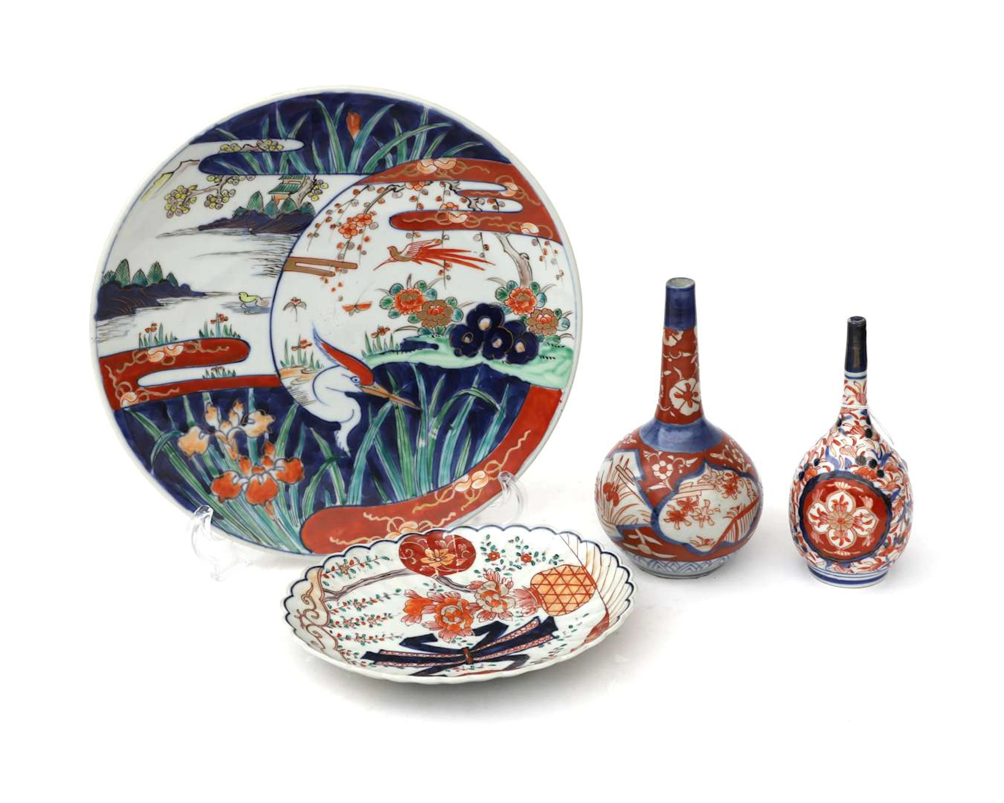 Two coloured porcelain tapered vases, an oval dish and a wall plate.