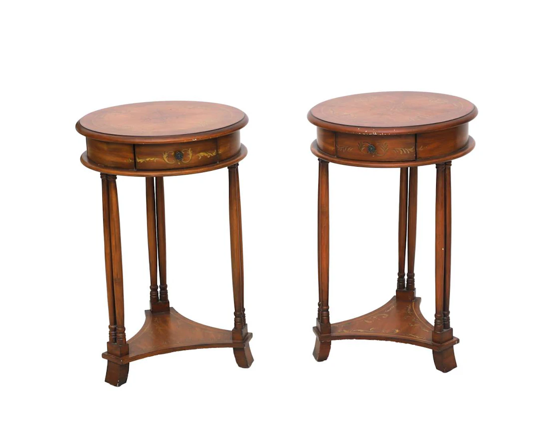 A pair of round wooden side tables, 20th century