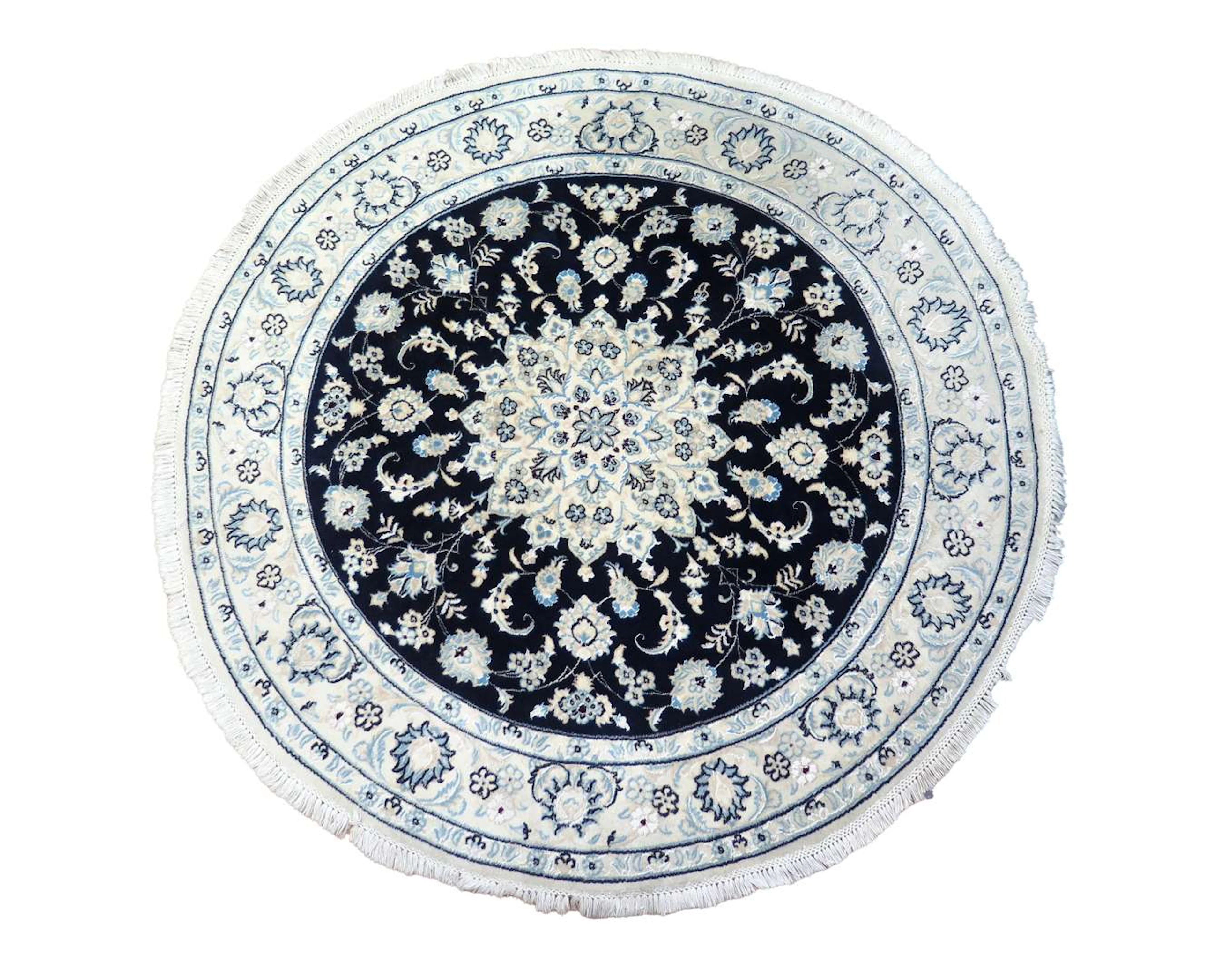 A round Oriental carpet, 206 cm in diameter.