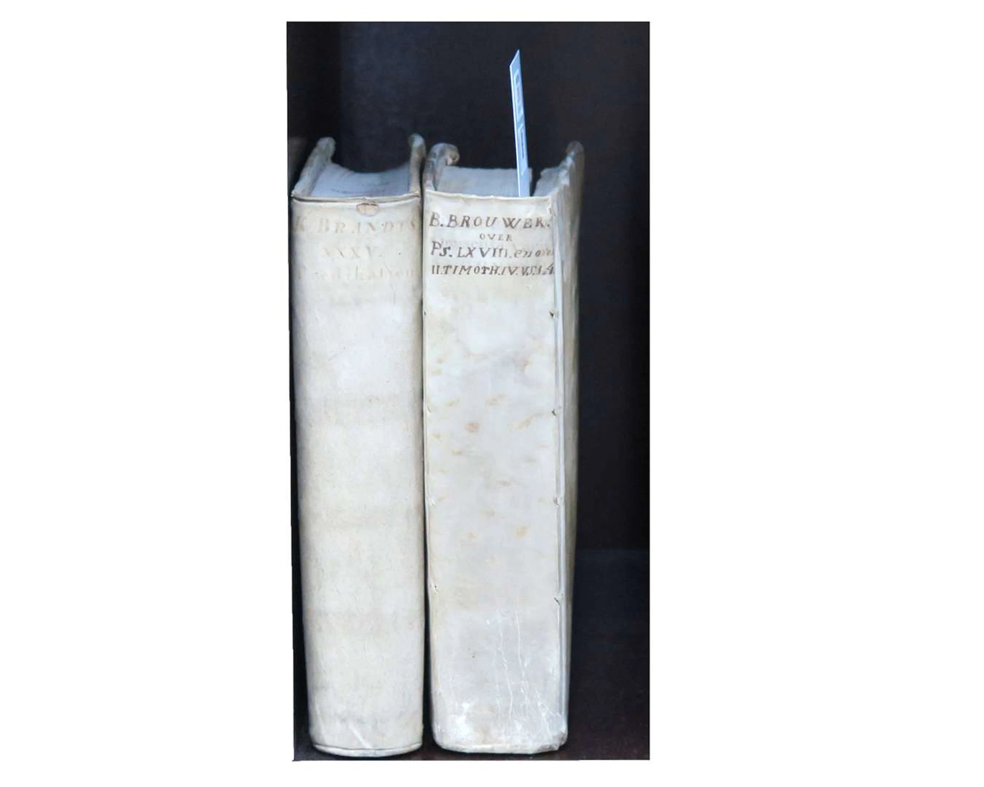 Two theological works in parchment bindings by K. Brandt (1698) and
