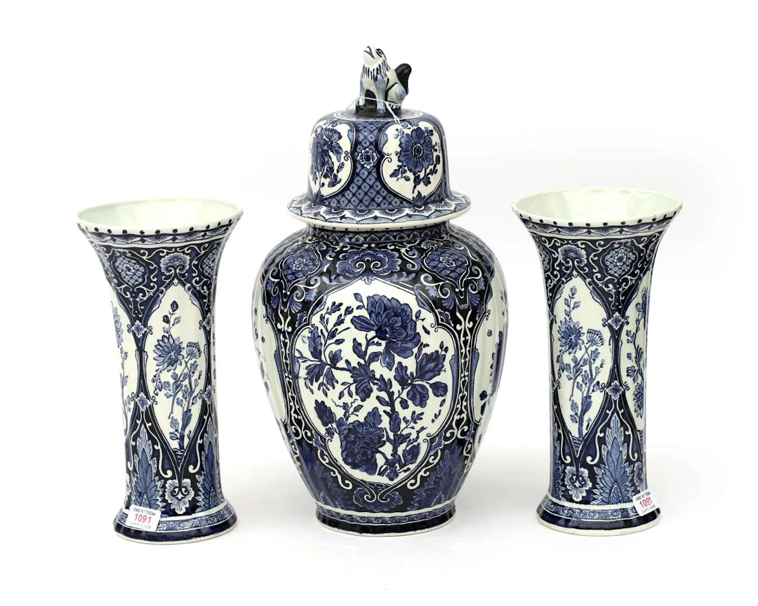 A Delft Blue cabinet set, Boch, Royal Sphinx, Holland, 20th century