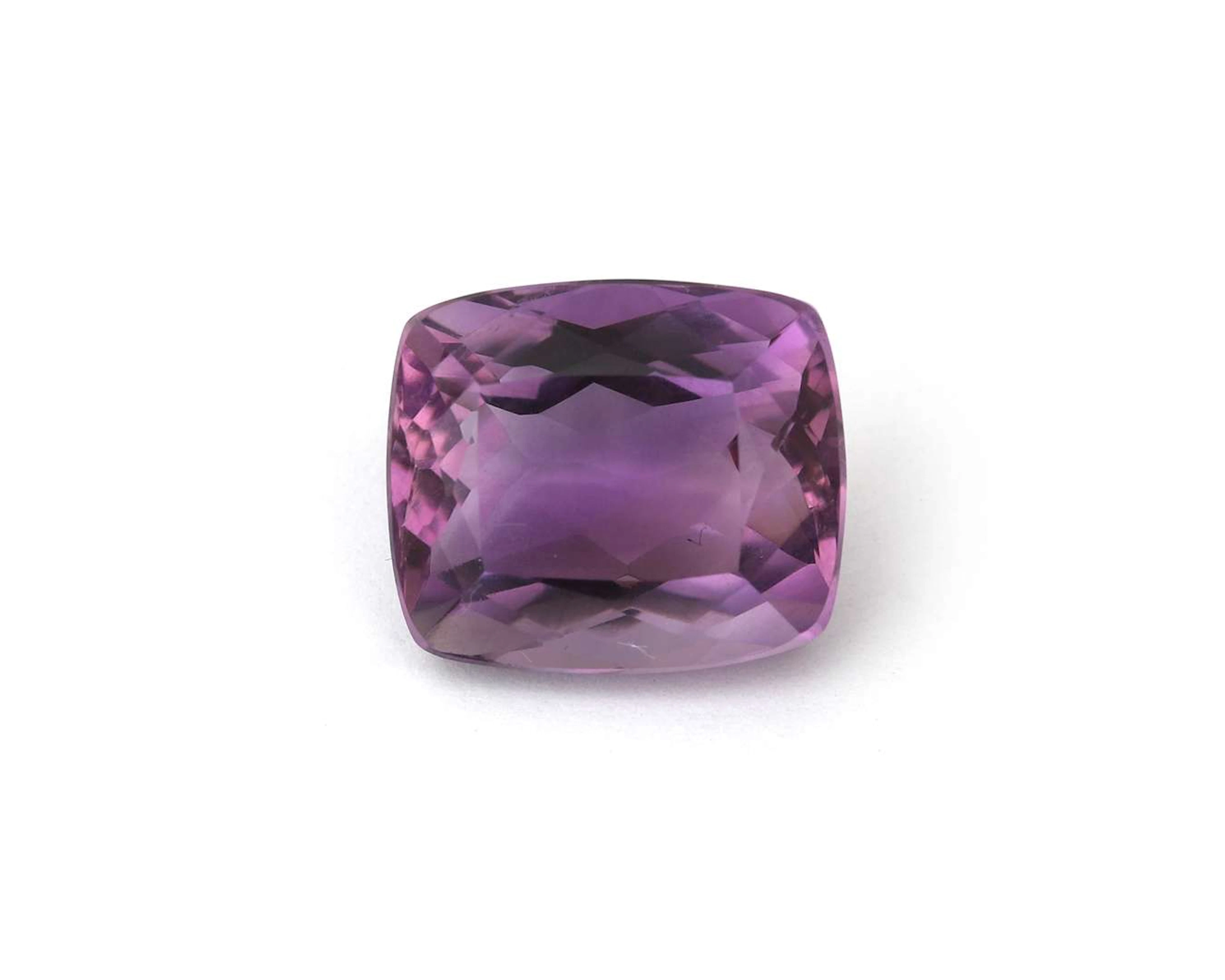 A cushion-cut amethyst gemstone