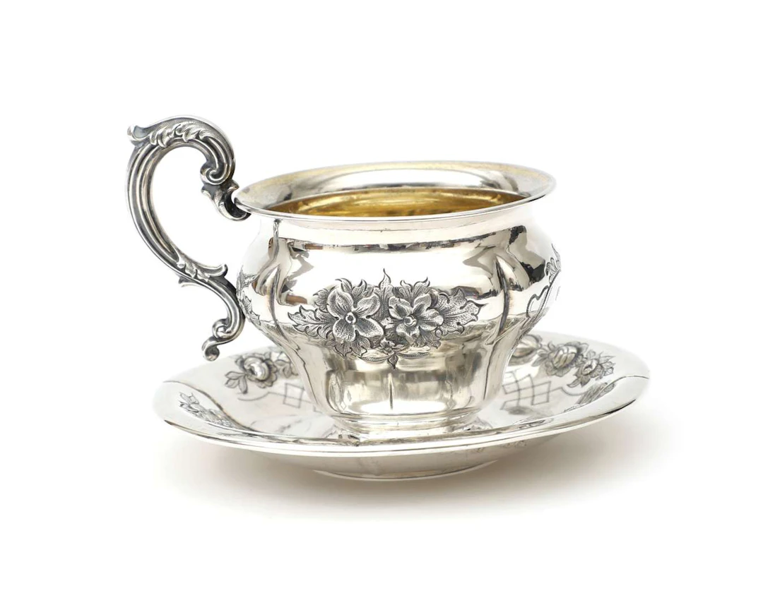A silver cup and saucer, Germany or Austria, 19th century