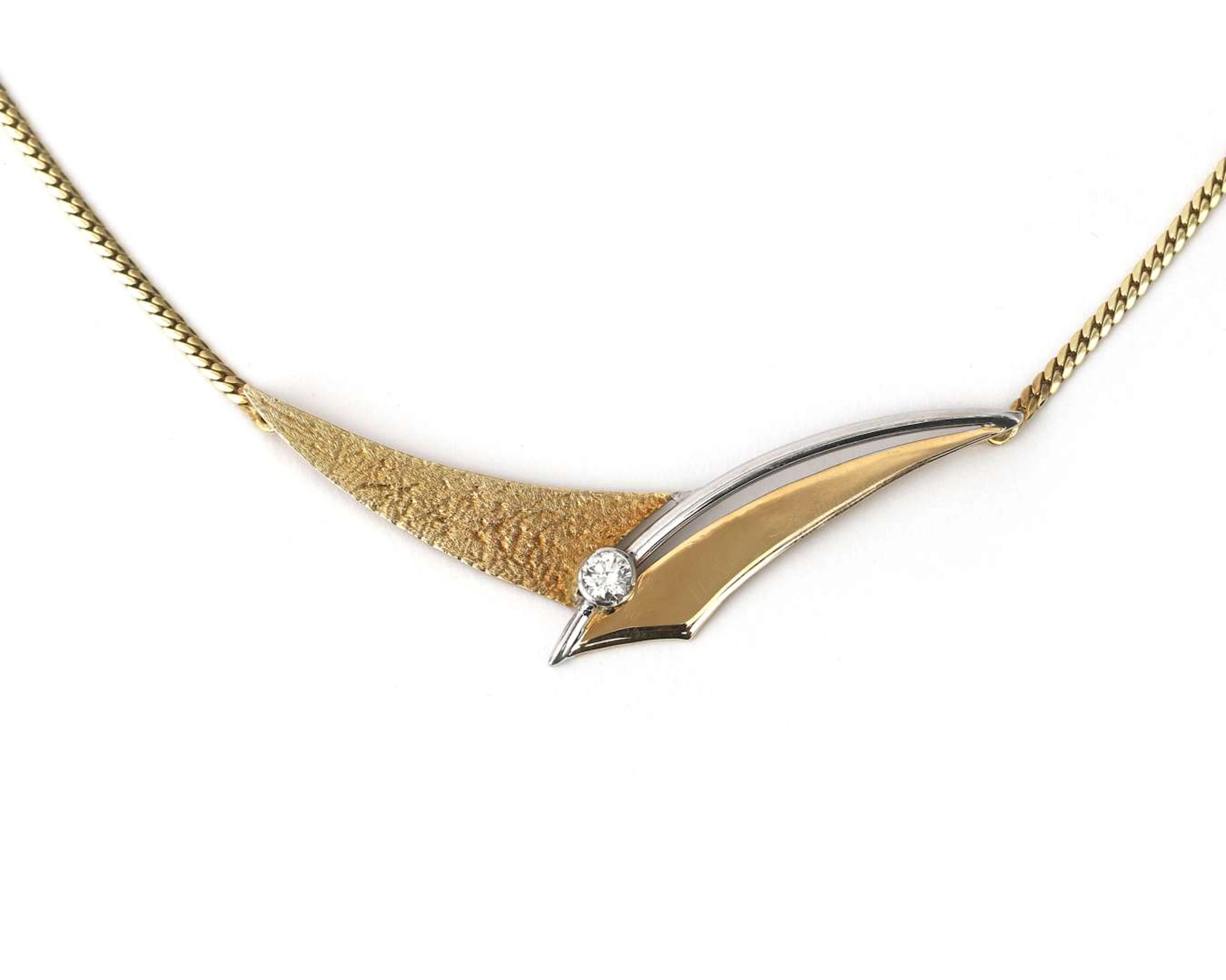 A 14k two-tone choker with a diamond, from the 1990s