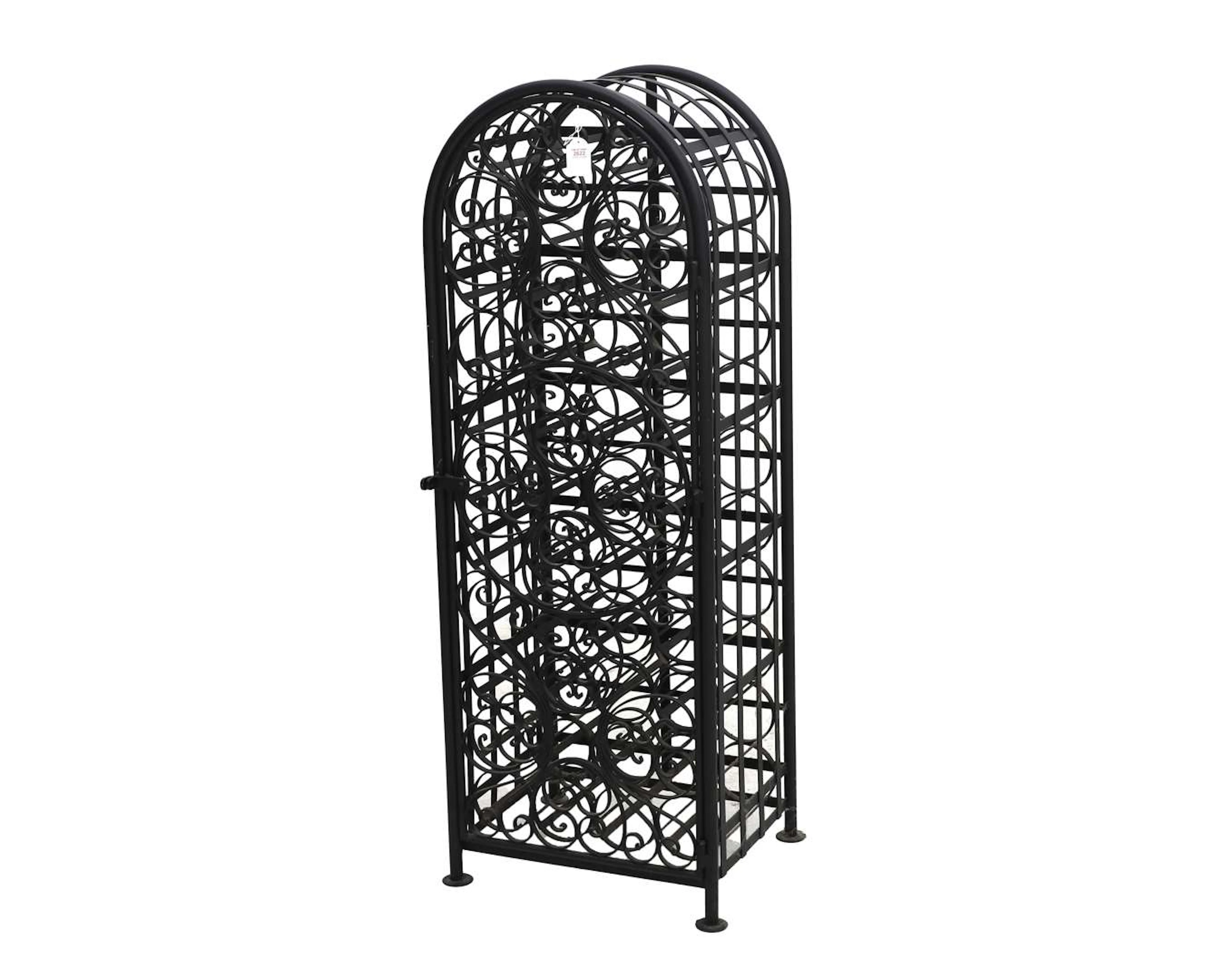 An iron wine rack with a door, 20th century