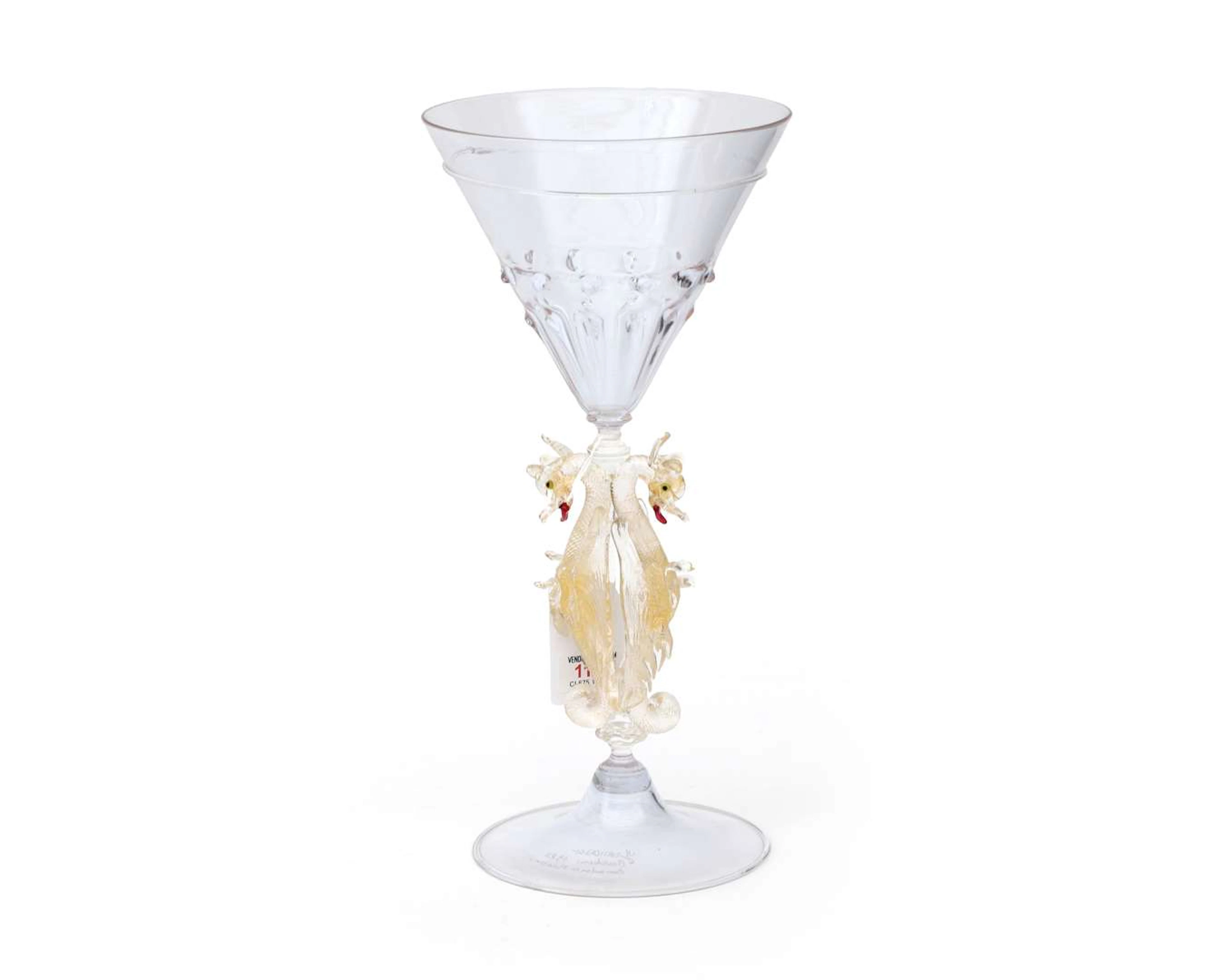 A glass, the stem featuring two dragons. Signed Francesco Bourbeni.