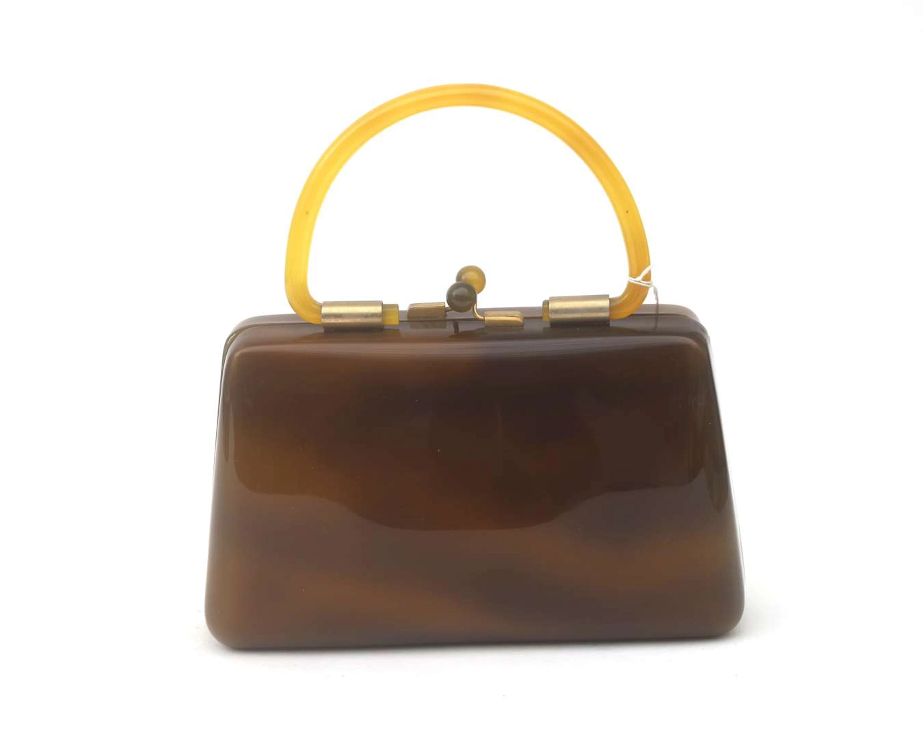 A mid-century lucite plastic handbag