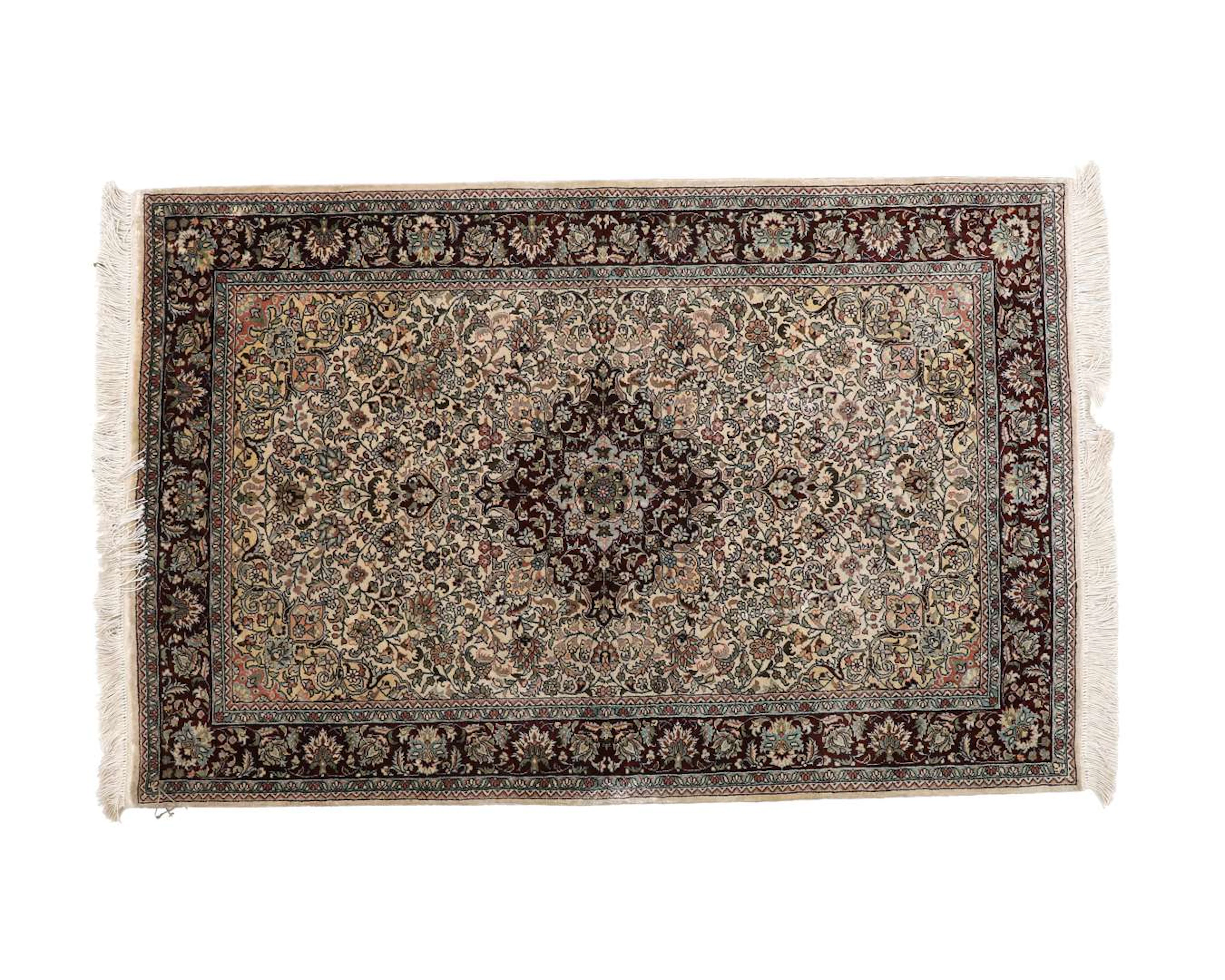 An Oriental rug, Sarouk, 20th/21st century, dimensions 125 x 81 cm.