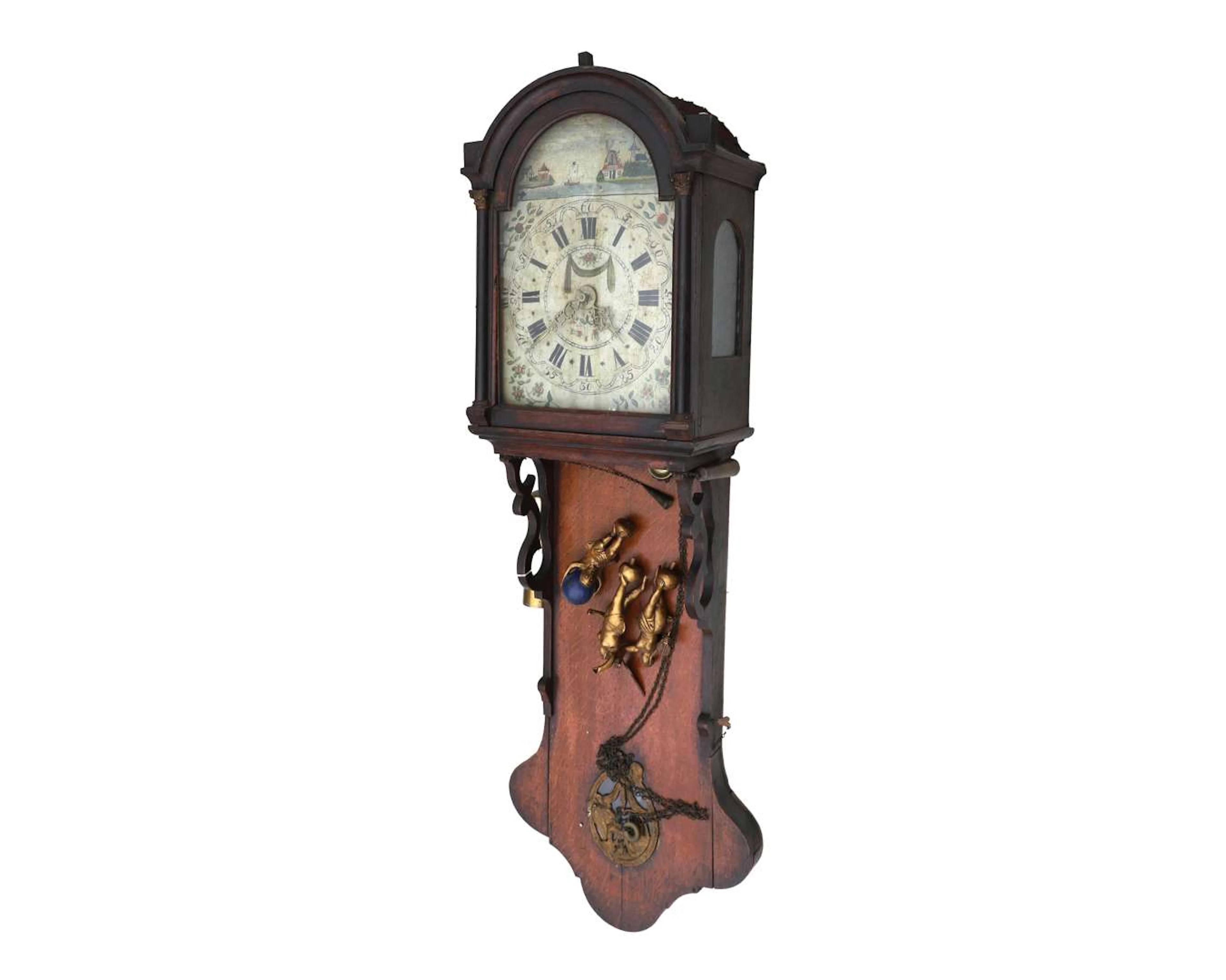 An oak Frisian pendulum clock. 19th century