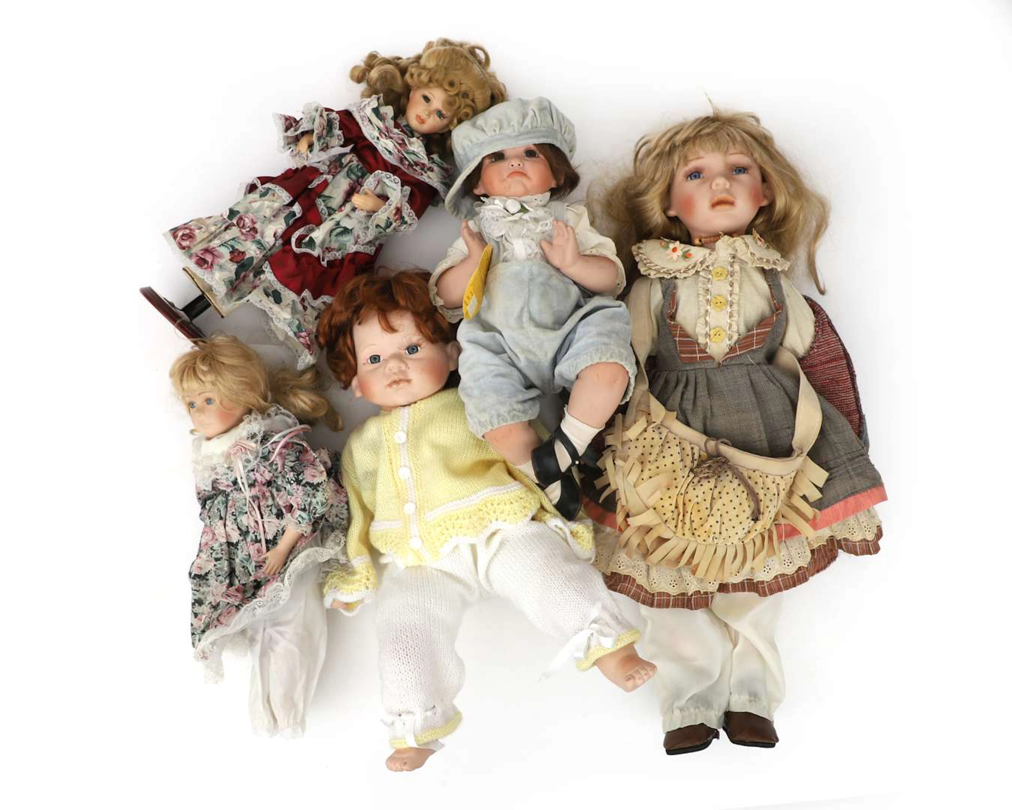 Five porcelain dolls, including Billy-Petronella, 20th century