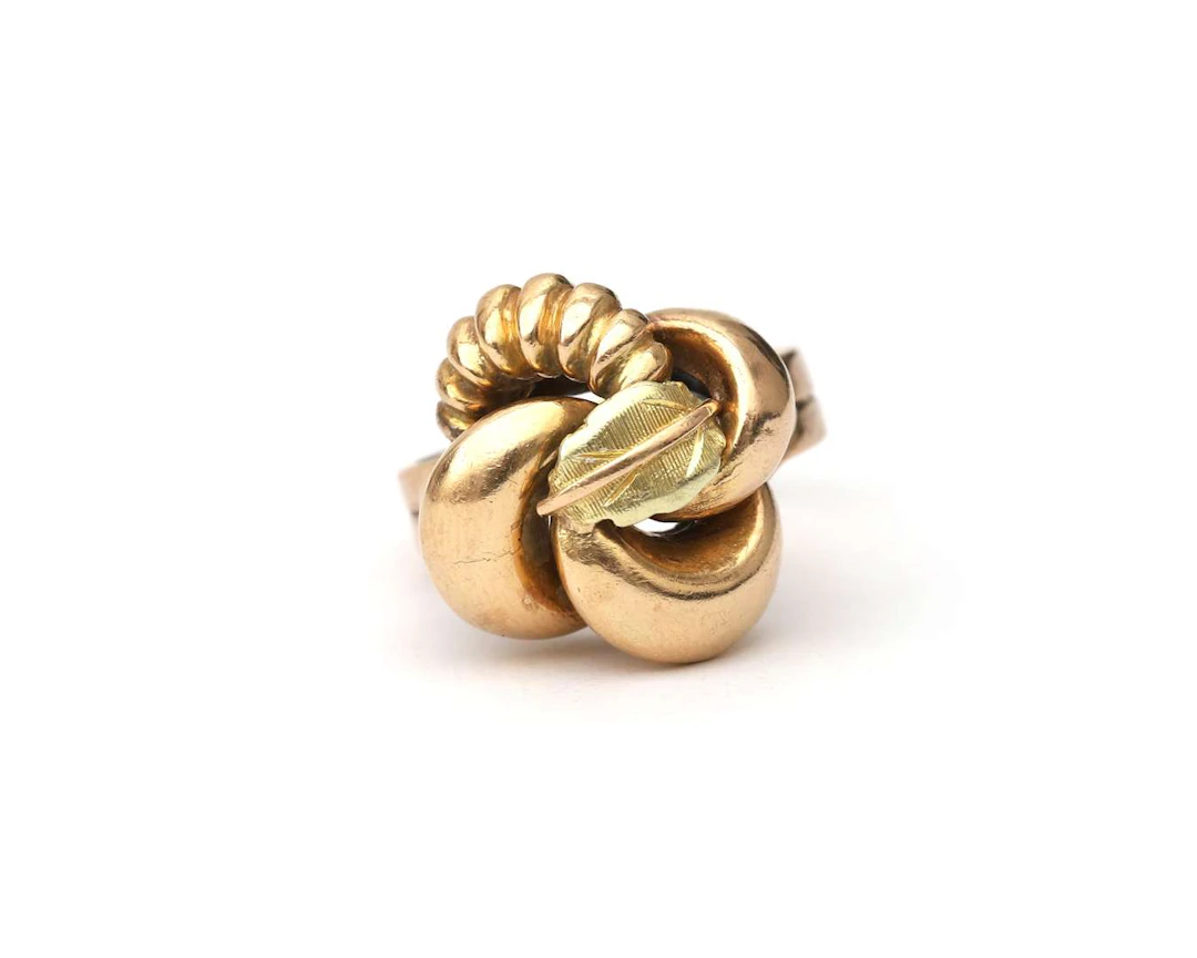 An 18k two-tone gold retro button ring, c. 1950–60