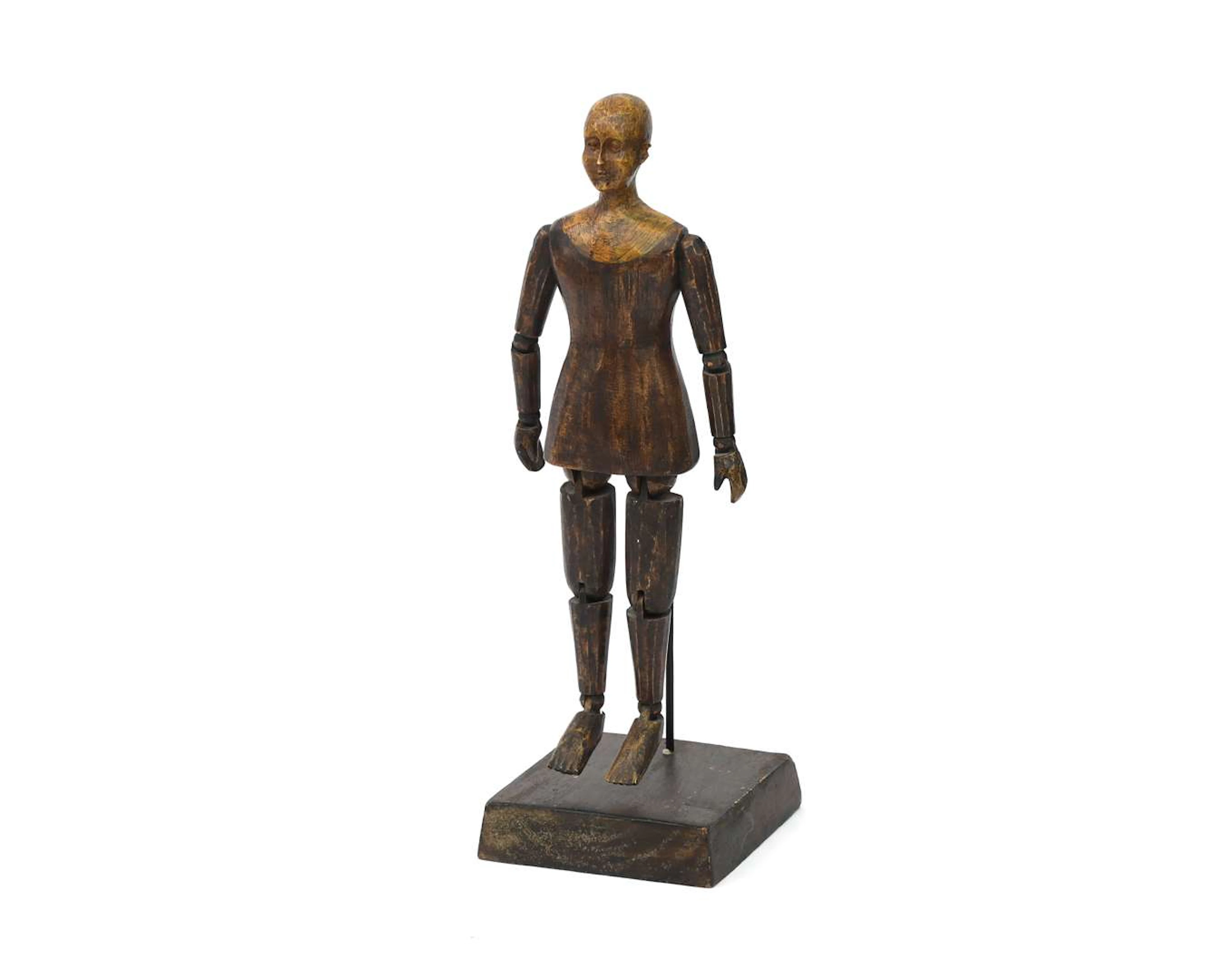 A carved wooden model doll, 19th century