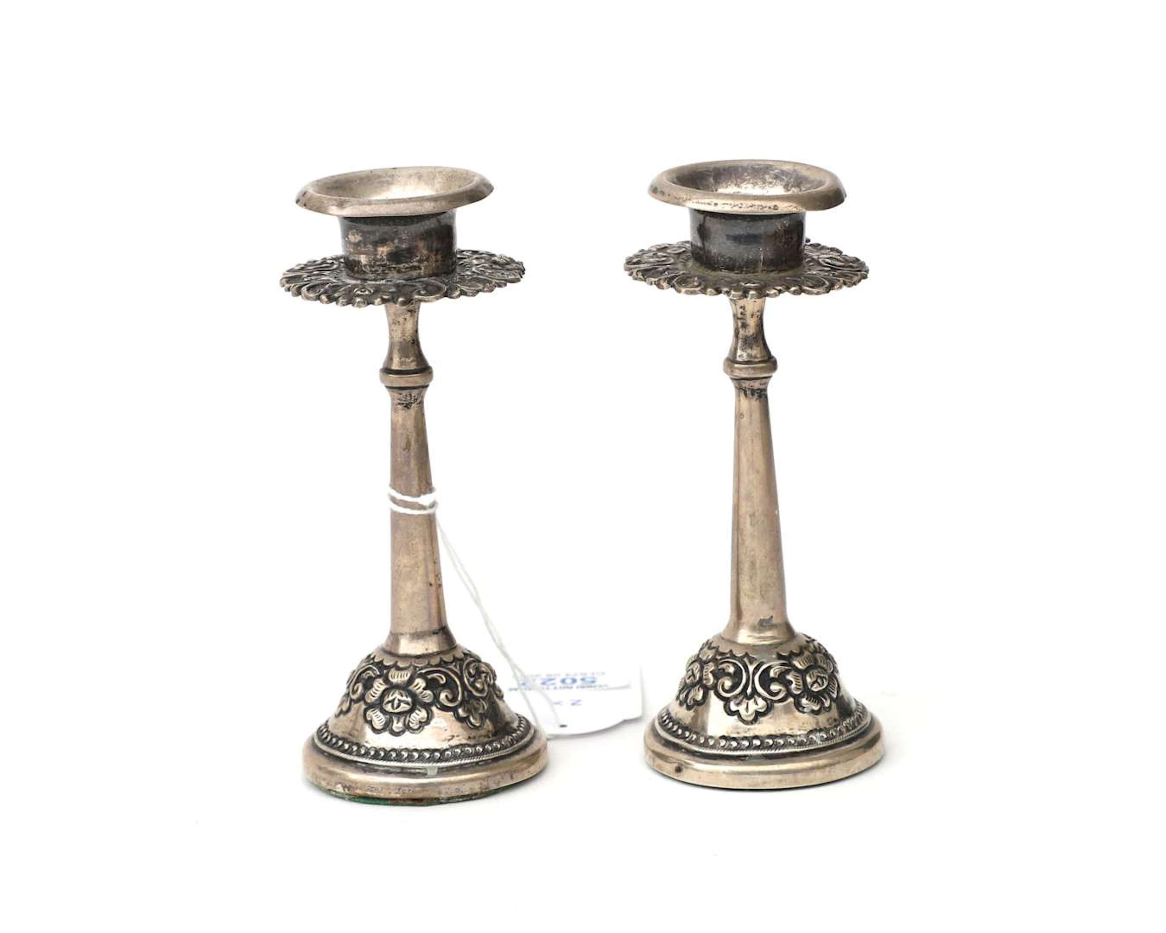 Two silver candlesticks, formerly from the Dutch East Indies/Indonesia