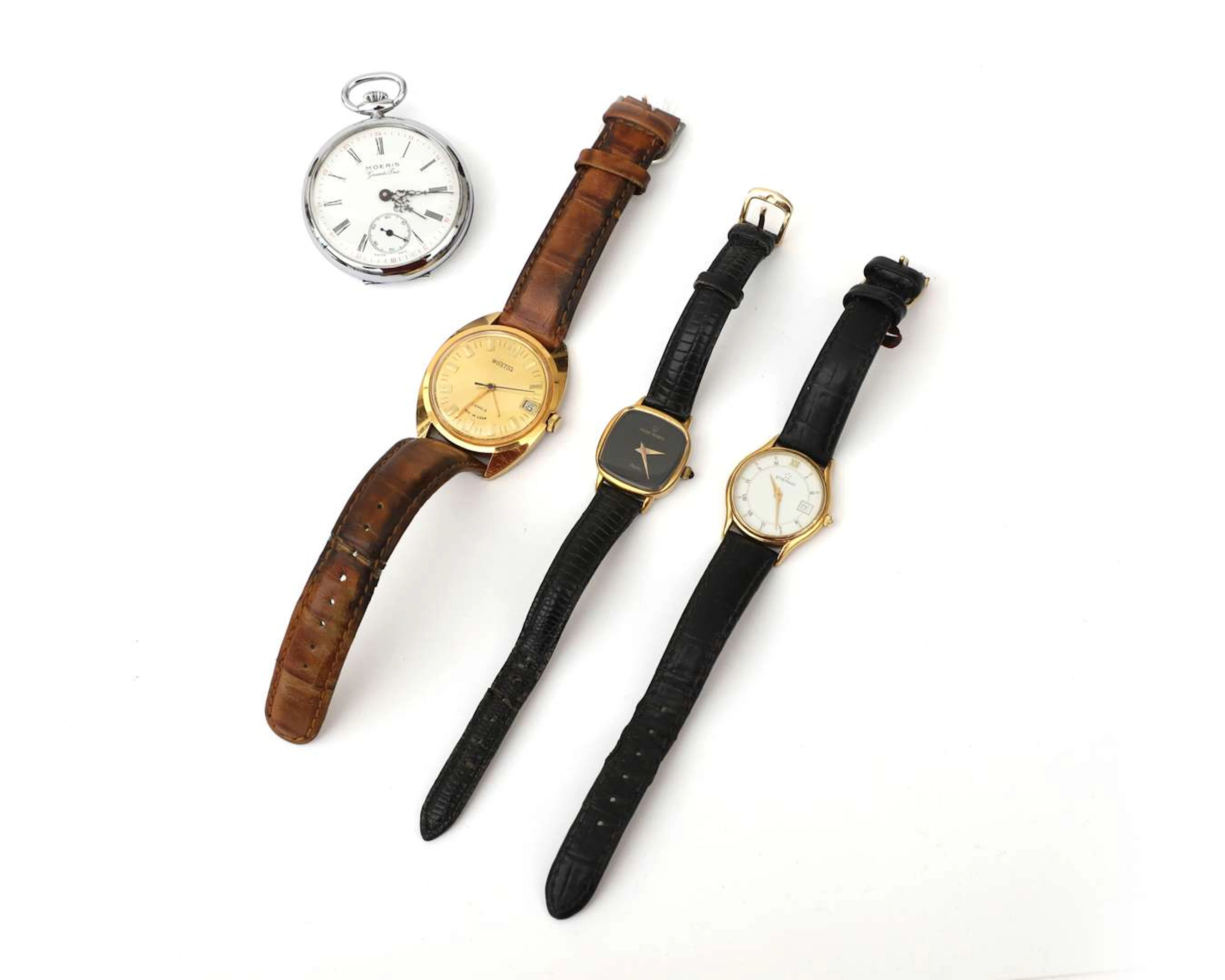 Four watches, including a Vostok men's wristwatch
