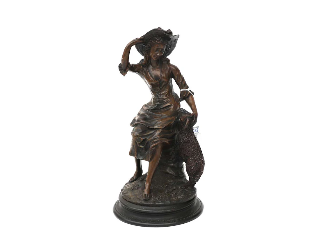 A shepherdess with a sheep