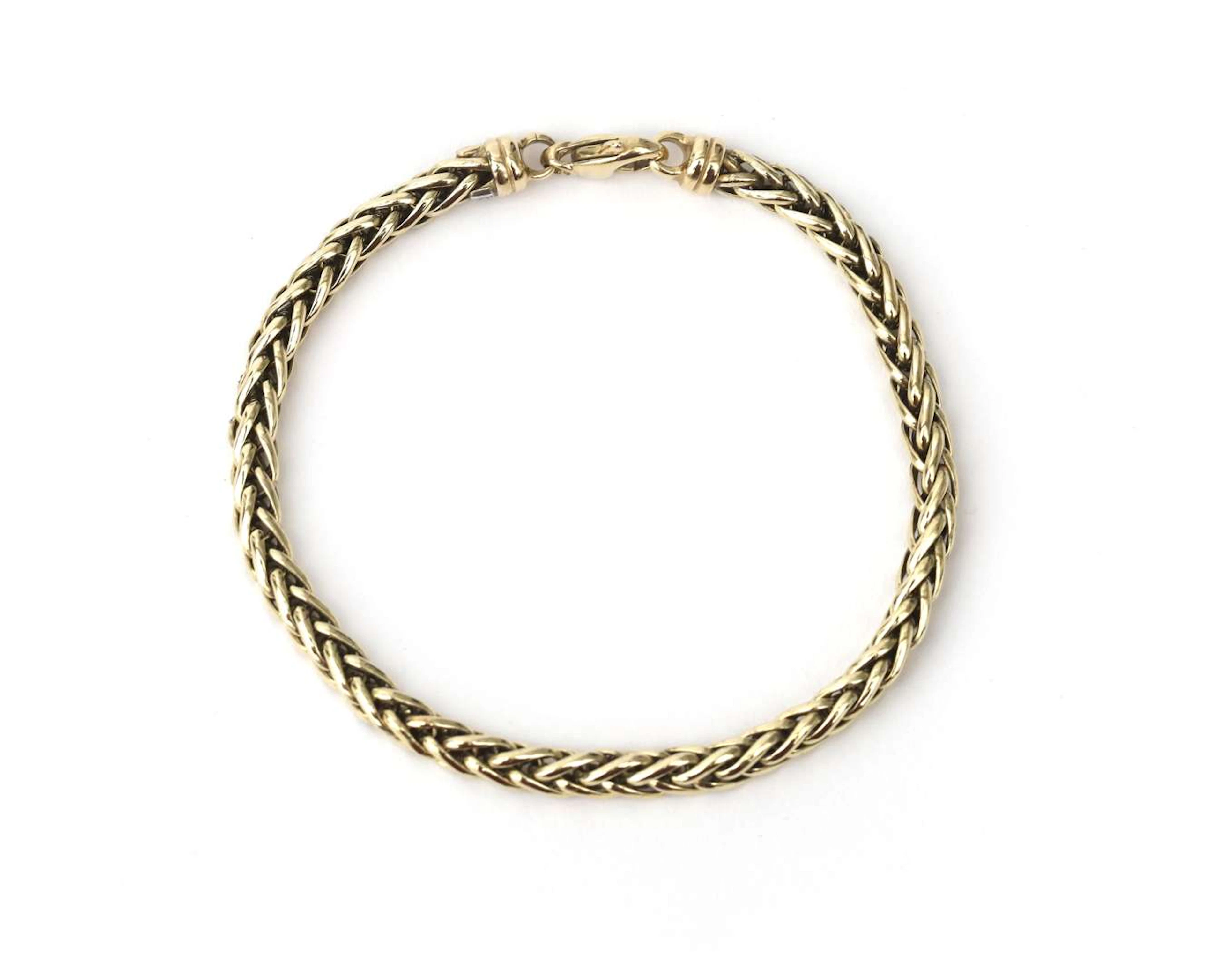 A 14k yellow gold foxtail link bracelet
