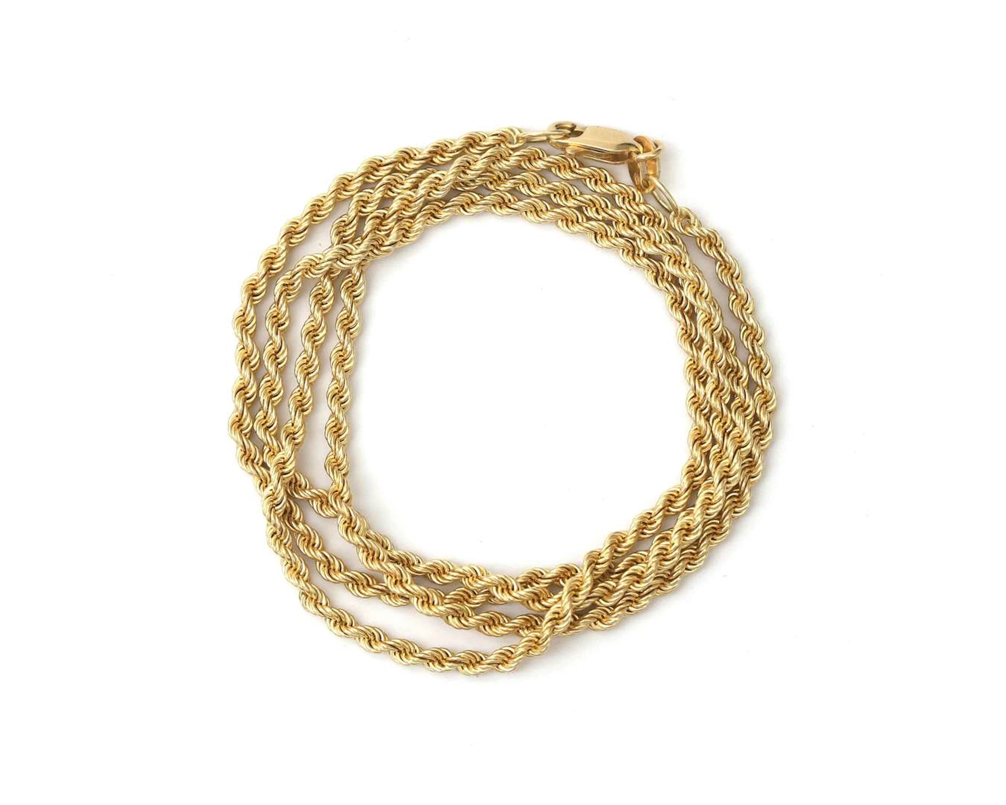 A 14k yellow gold cord necklace