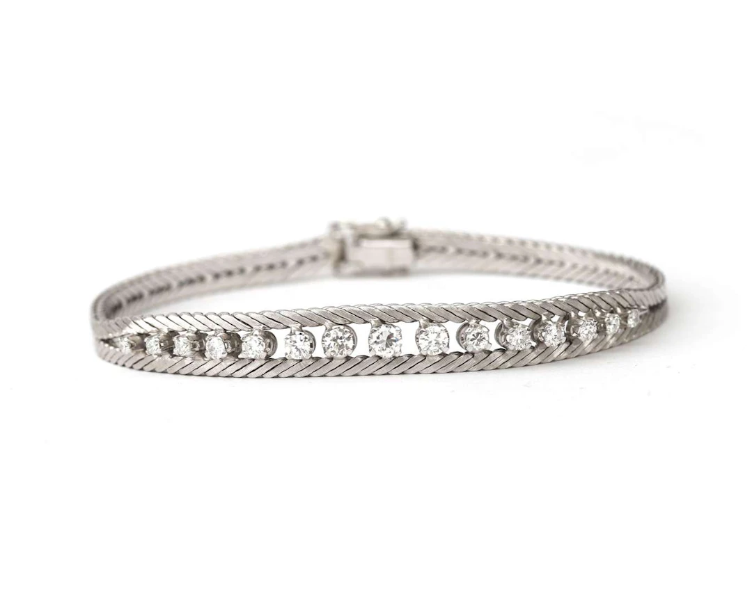 A 14k white gold bracelet with a diamond, from the 1970s