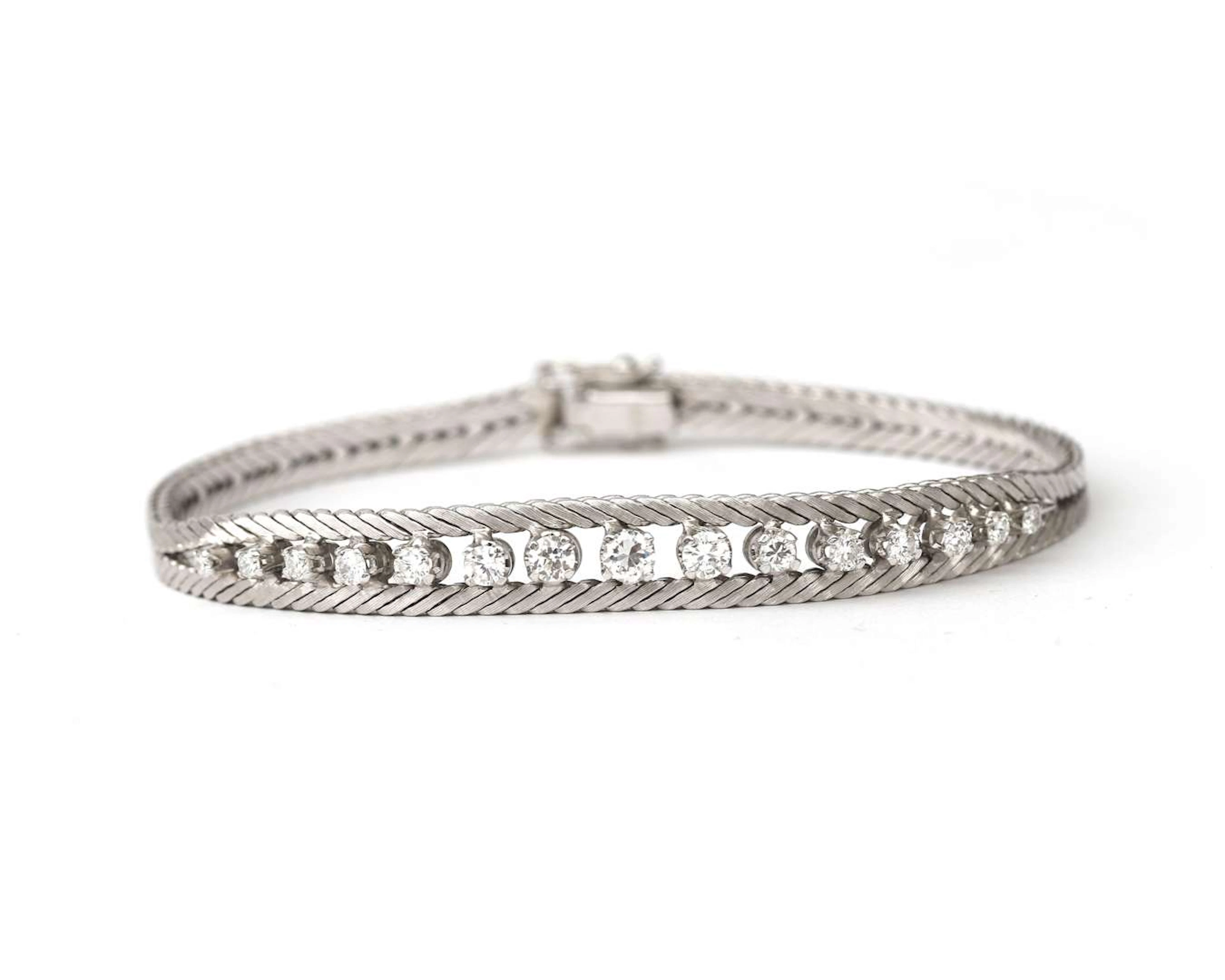 A 14k white gold bracelet with a diamond, from the 1970s