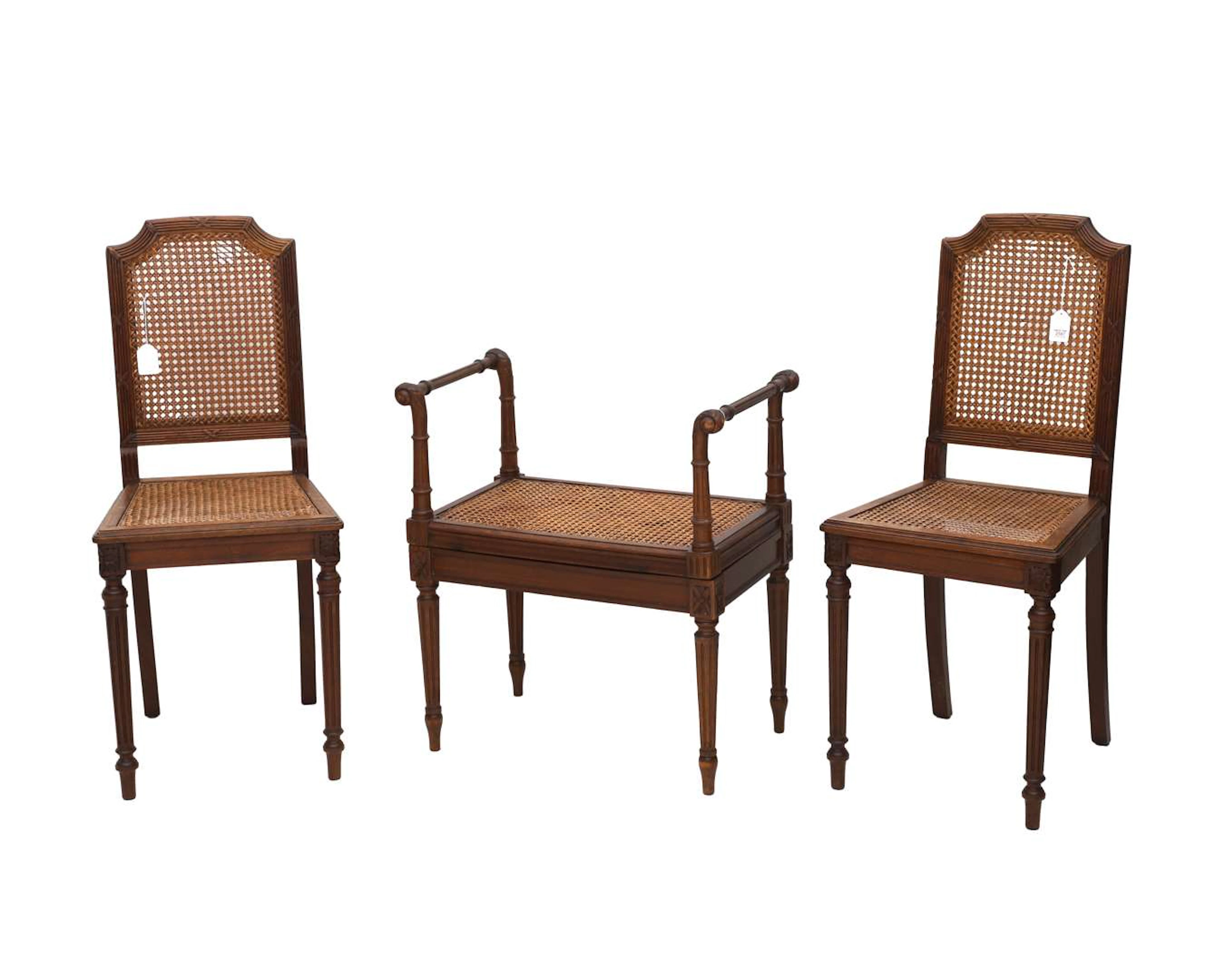 A pair of Louis XVI-style chairs and a footstool, 20th century
